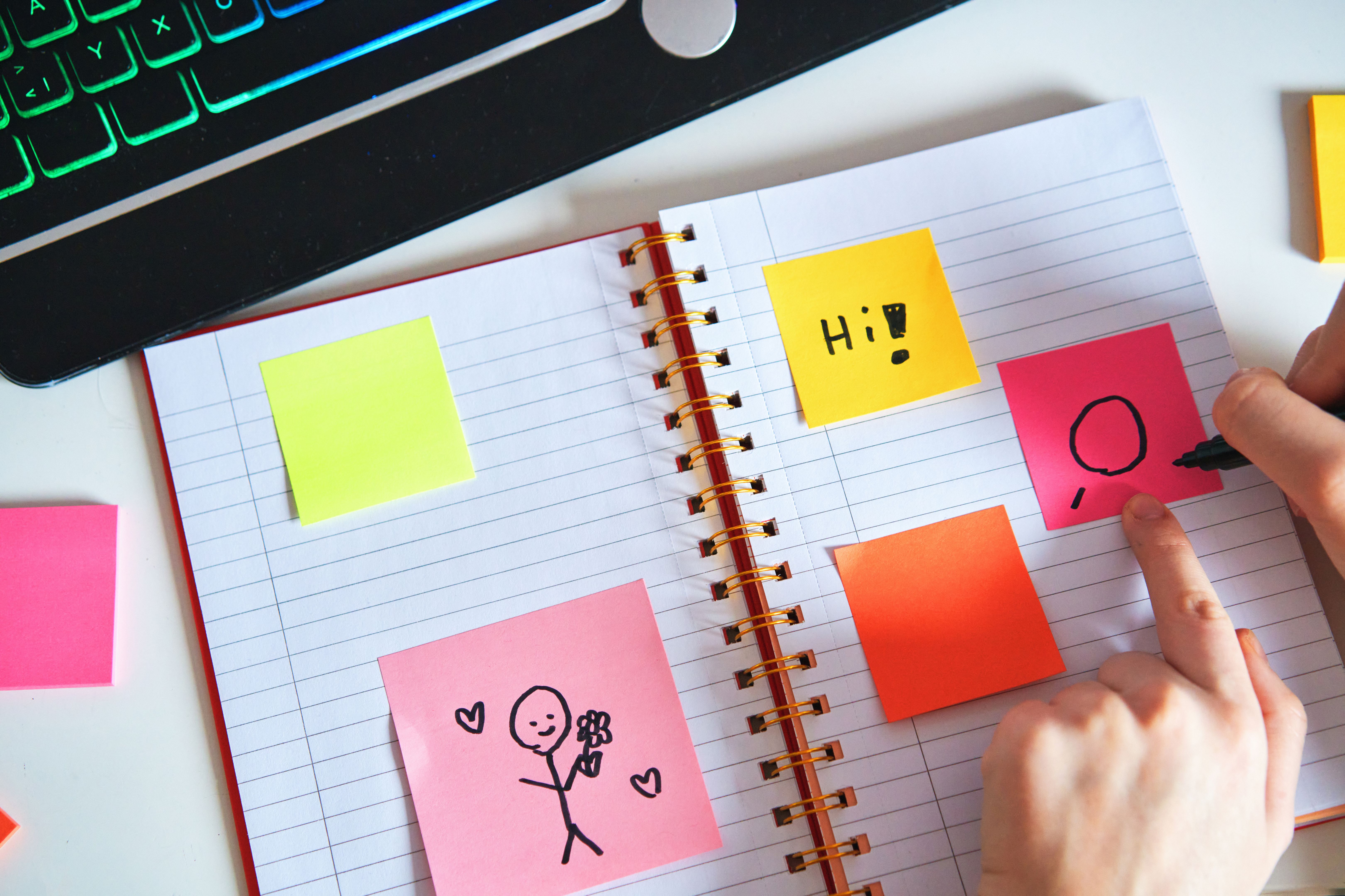 Young Girl Writing To-Do-List with sticky notes