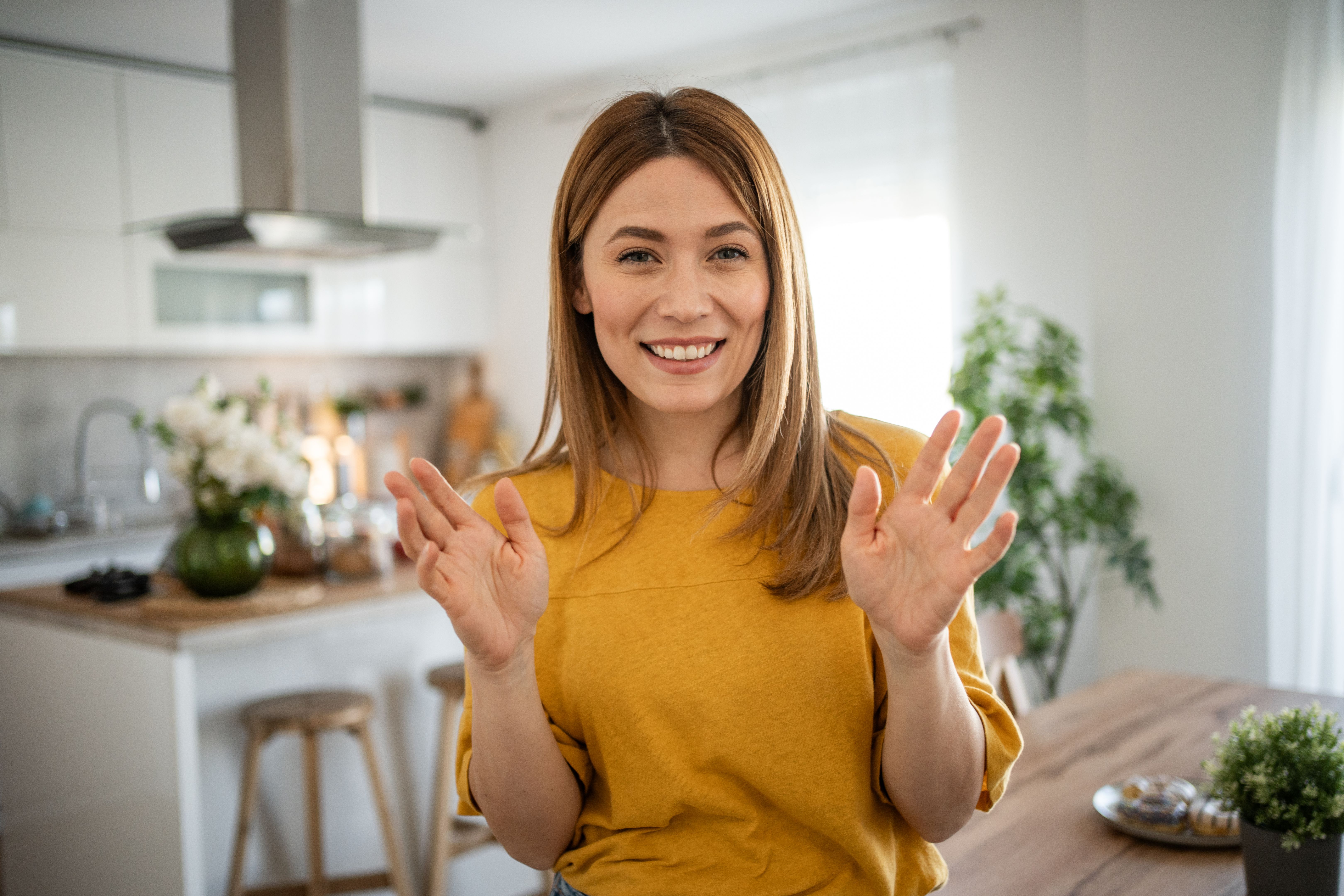 A young female vlogger is making a video