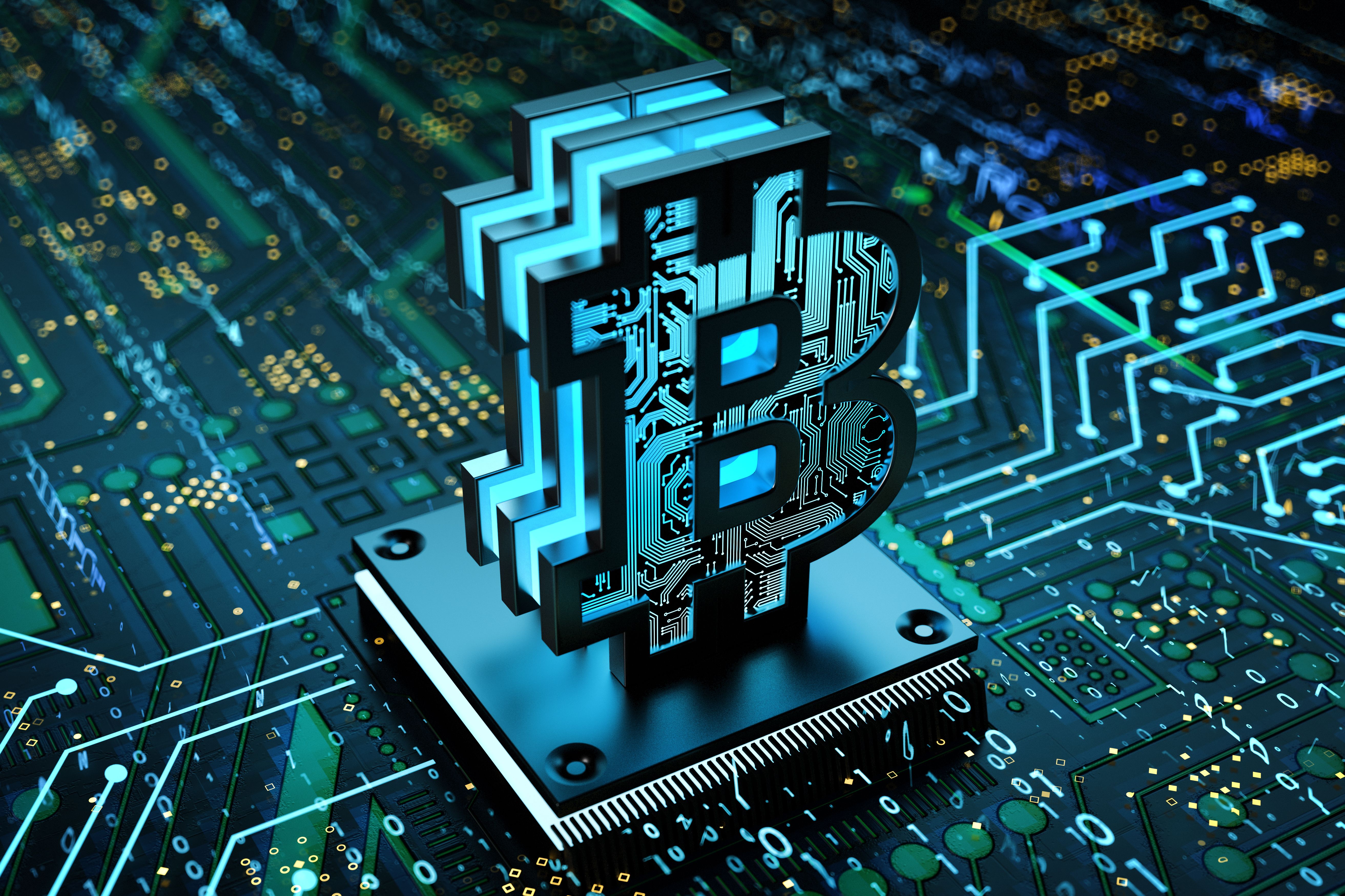 Cryptocurrency Blockchain Concept with Bitcoin Symbol on the Motherboard