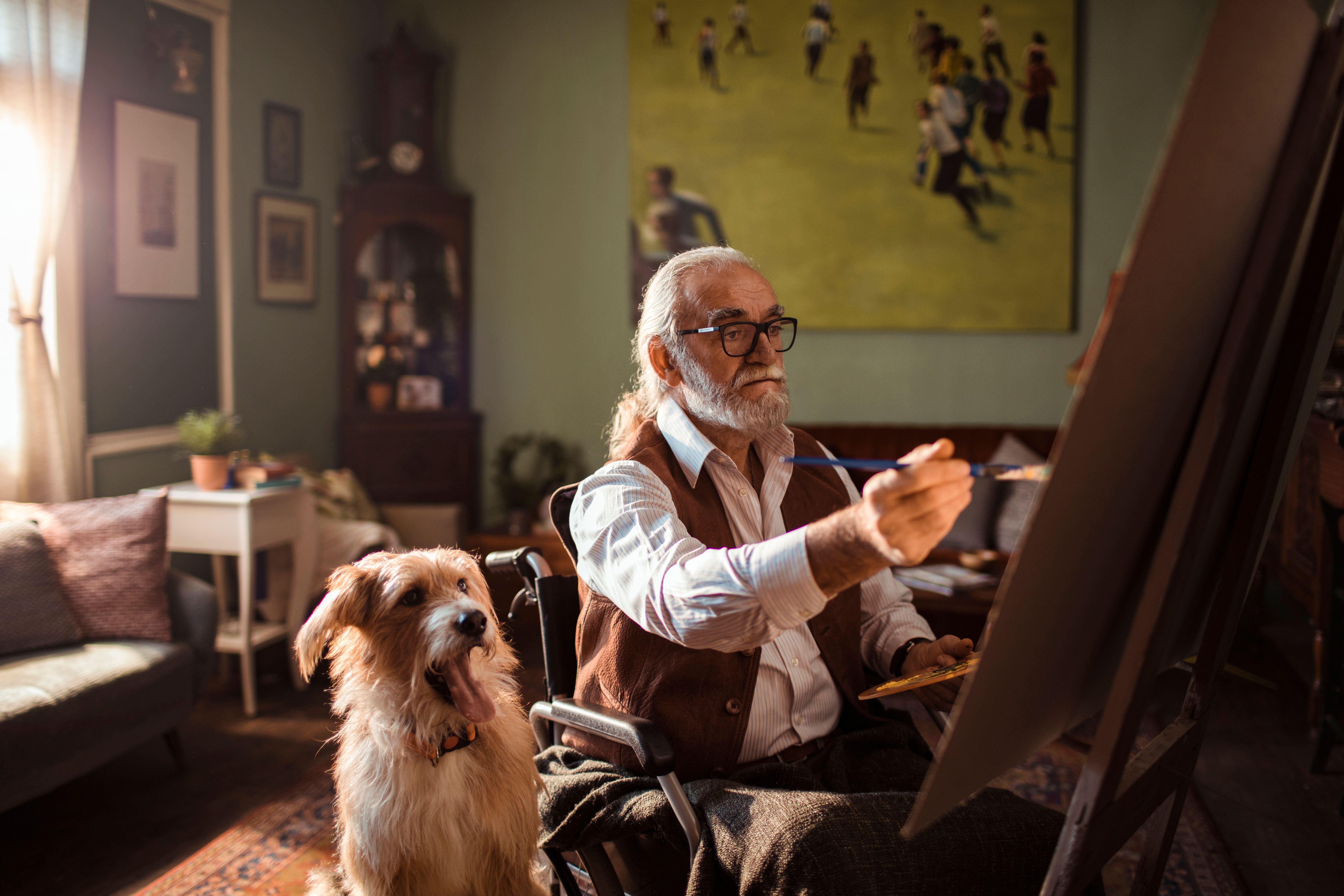 artist painting dog