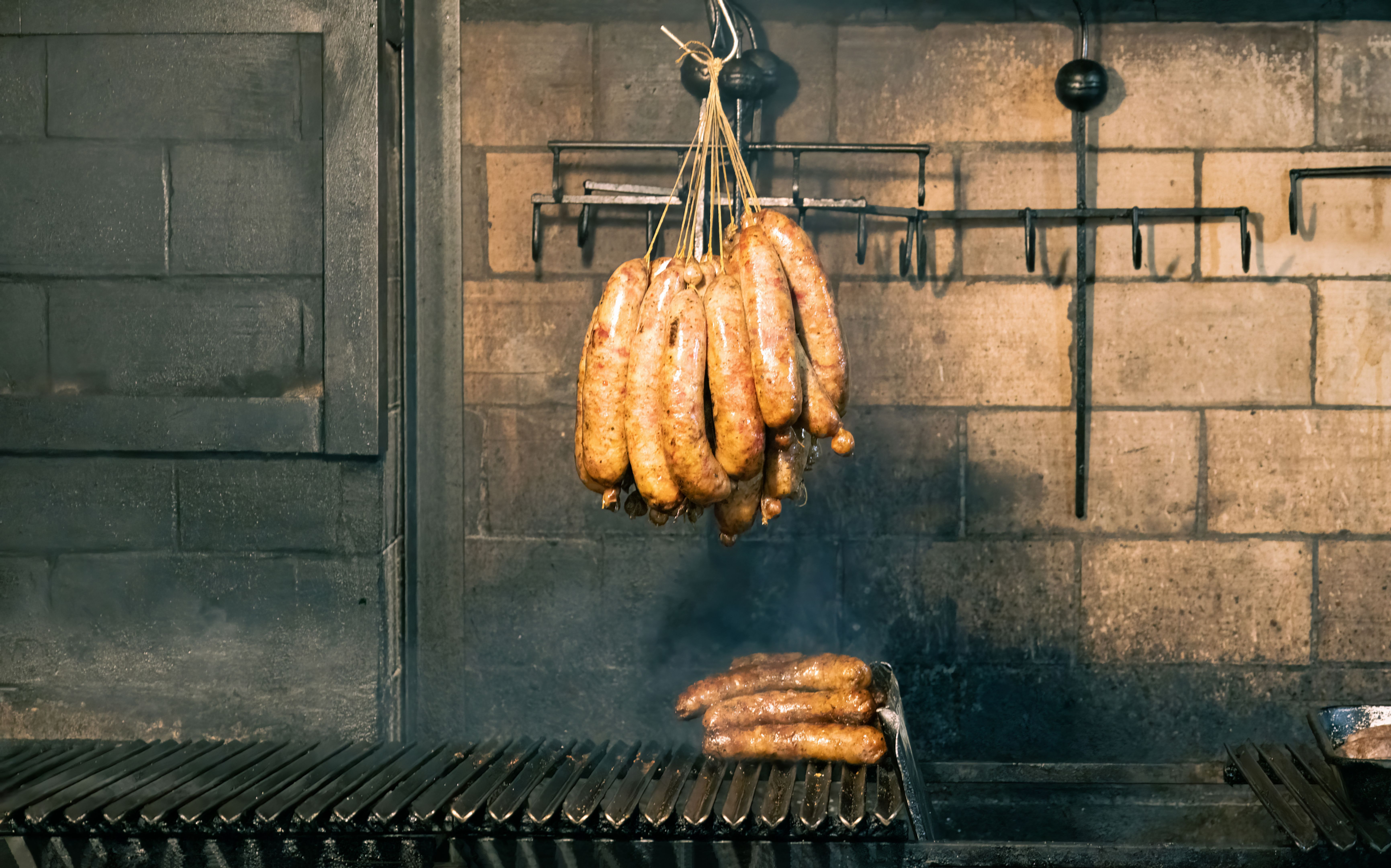 Argentina, San Telmo market restaurants offering parilla grilled meat traditional cuisine