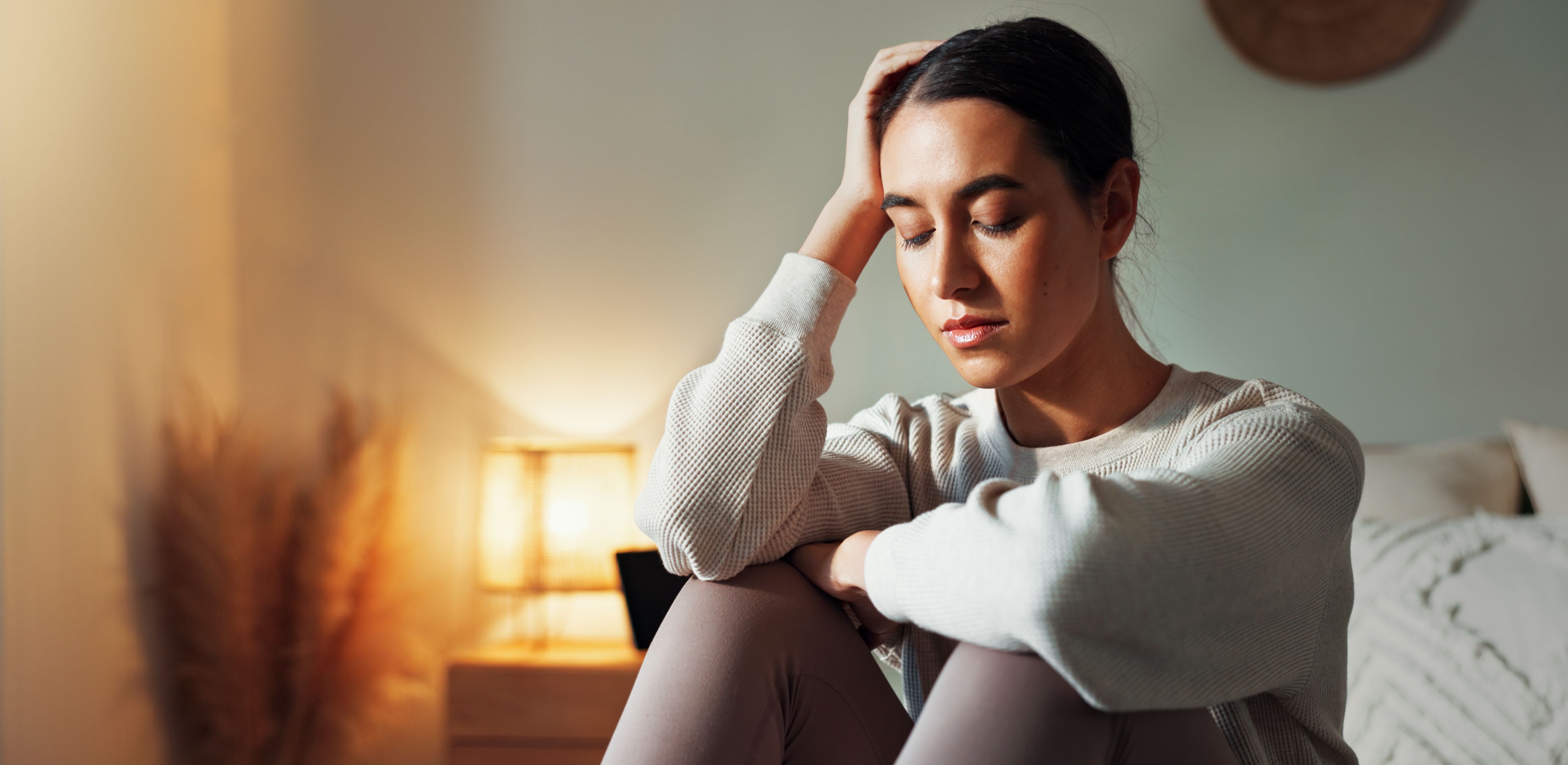 Woman, thinking and morning in home for stress, burnout and bad mental health in bedroom. Female person, imagine solution and hope of depression recovery in apartment, anxiety and mindfulness on bed Woman, thinking and morning in home for stress, burnout and bad mental health in bedroom. Female person, imagine solution and hope of depression recovery in apartment, anxiety and mindfulness on bed