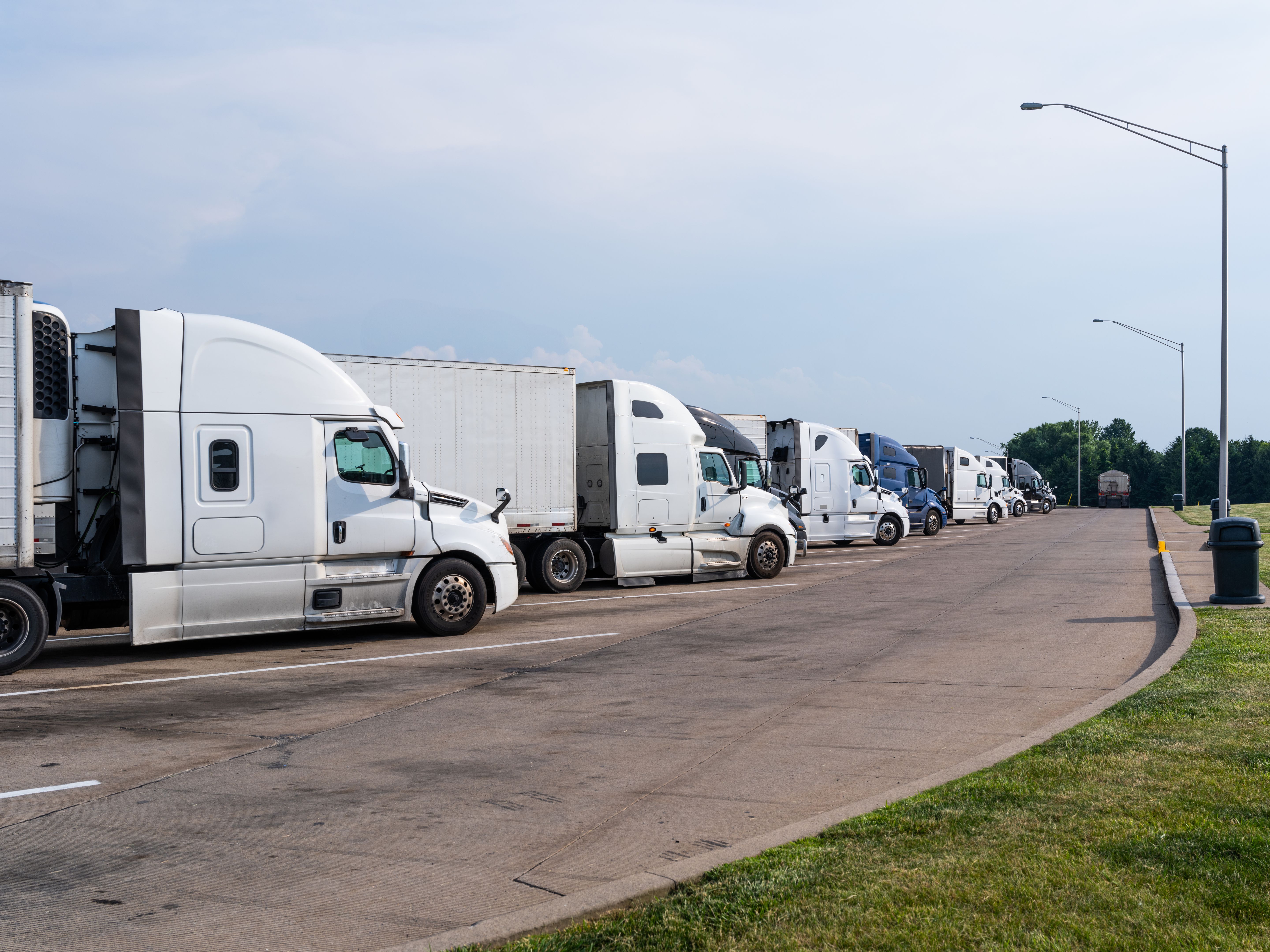 Trucks parked at rest stop on highway