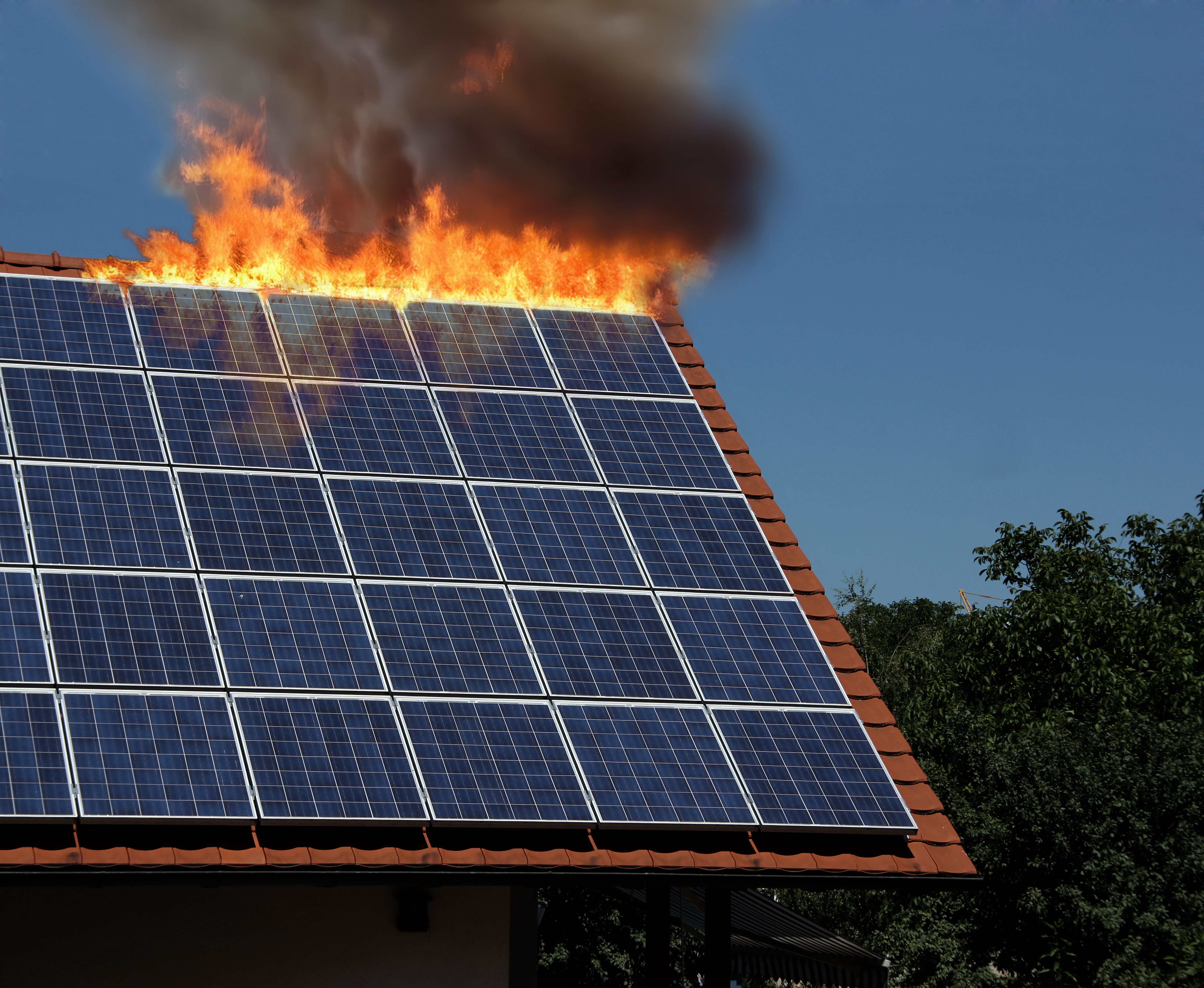 Burning roof of a single-family house with photovoltaics