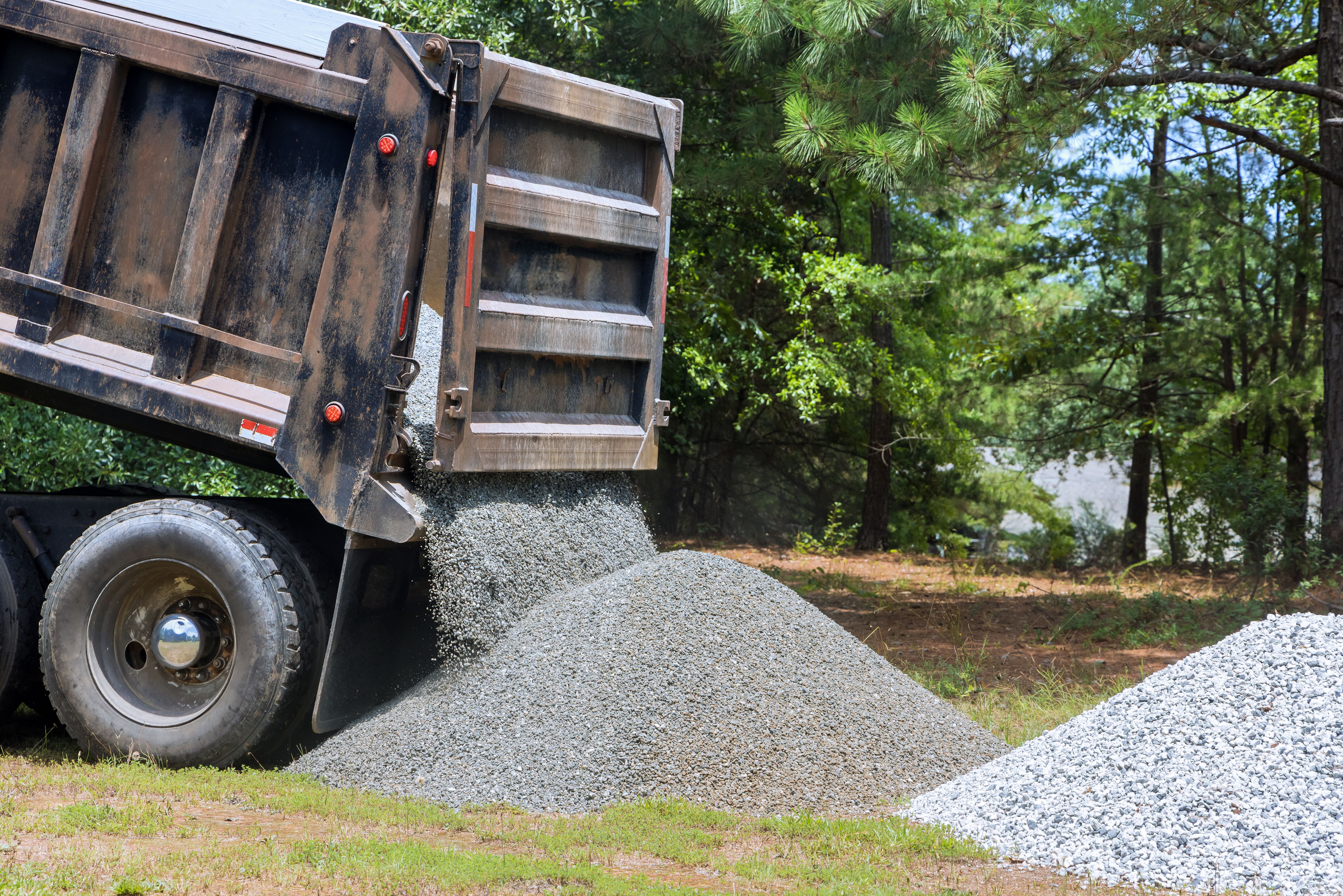 Delivery of gravel to residential area for landscaping construction improvements