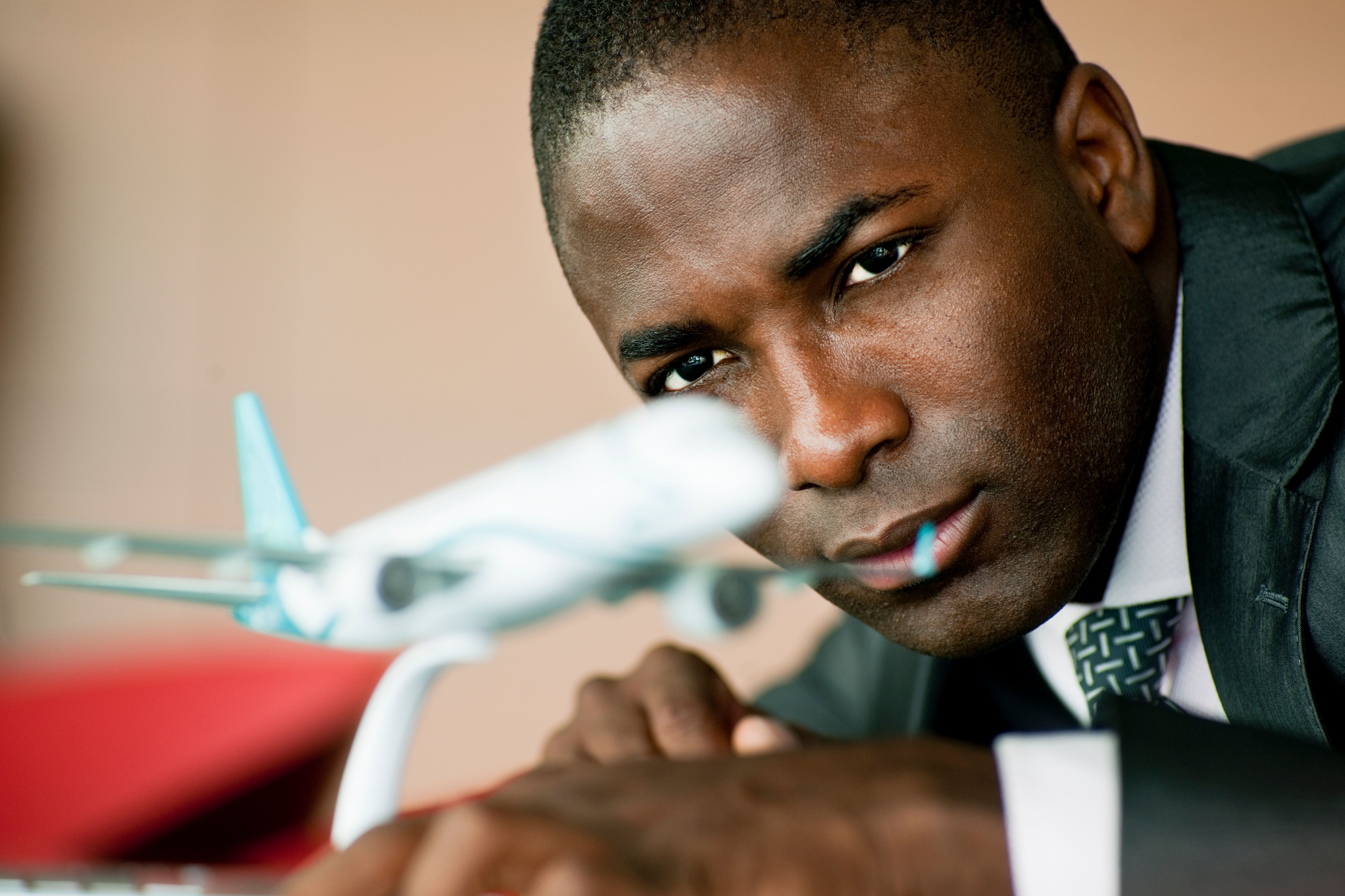 Young Engineer With His Airplane Model Young Engineer With His Airplane Model