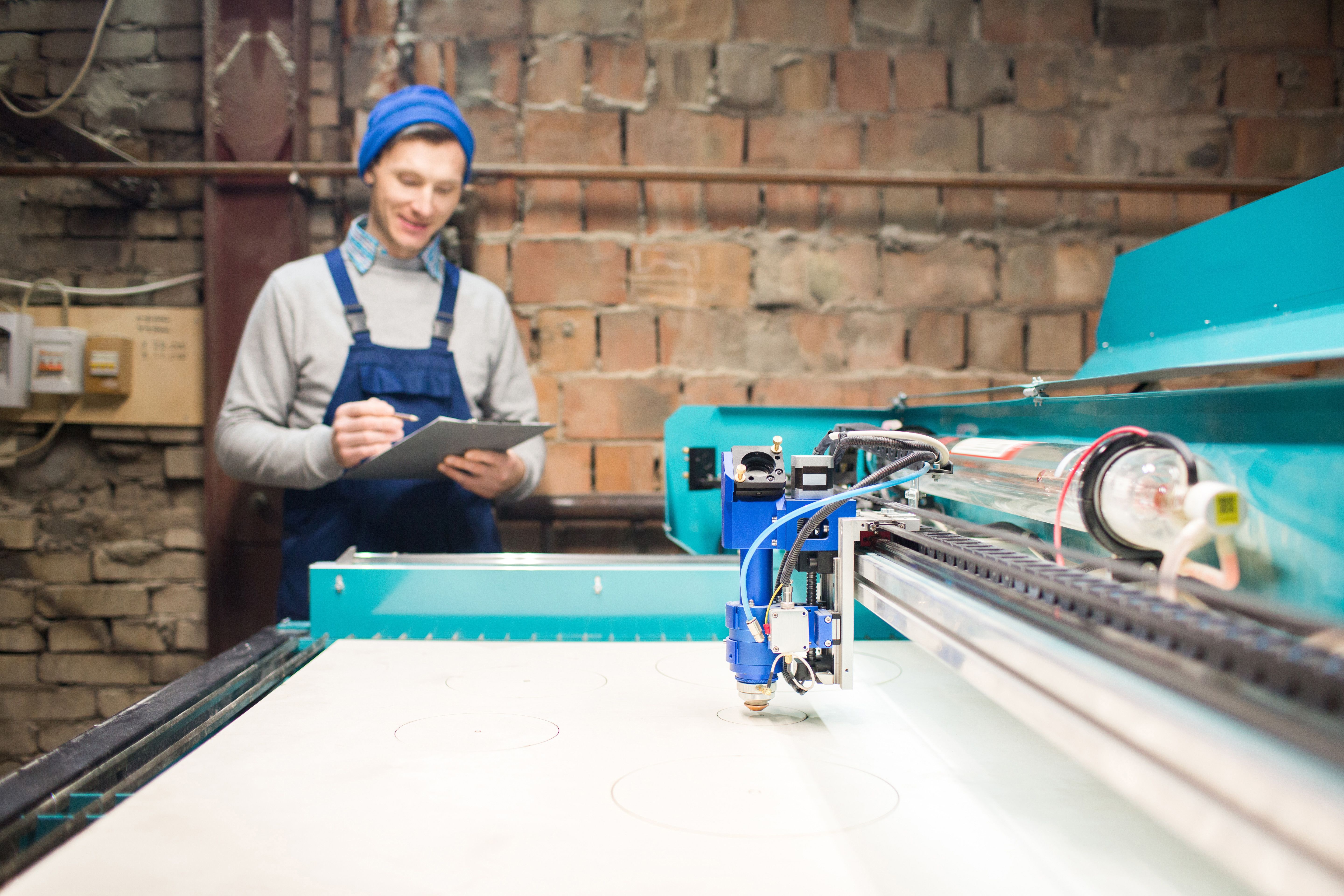 student using laser engraver