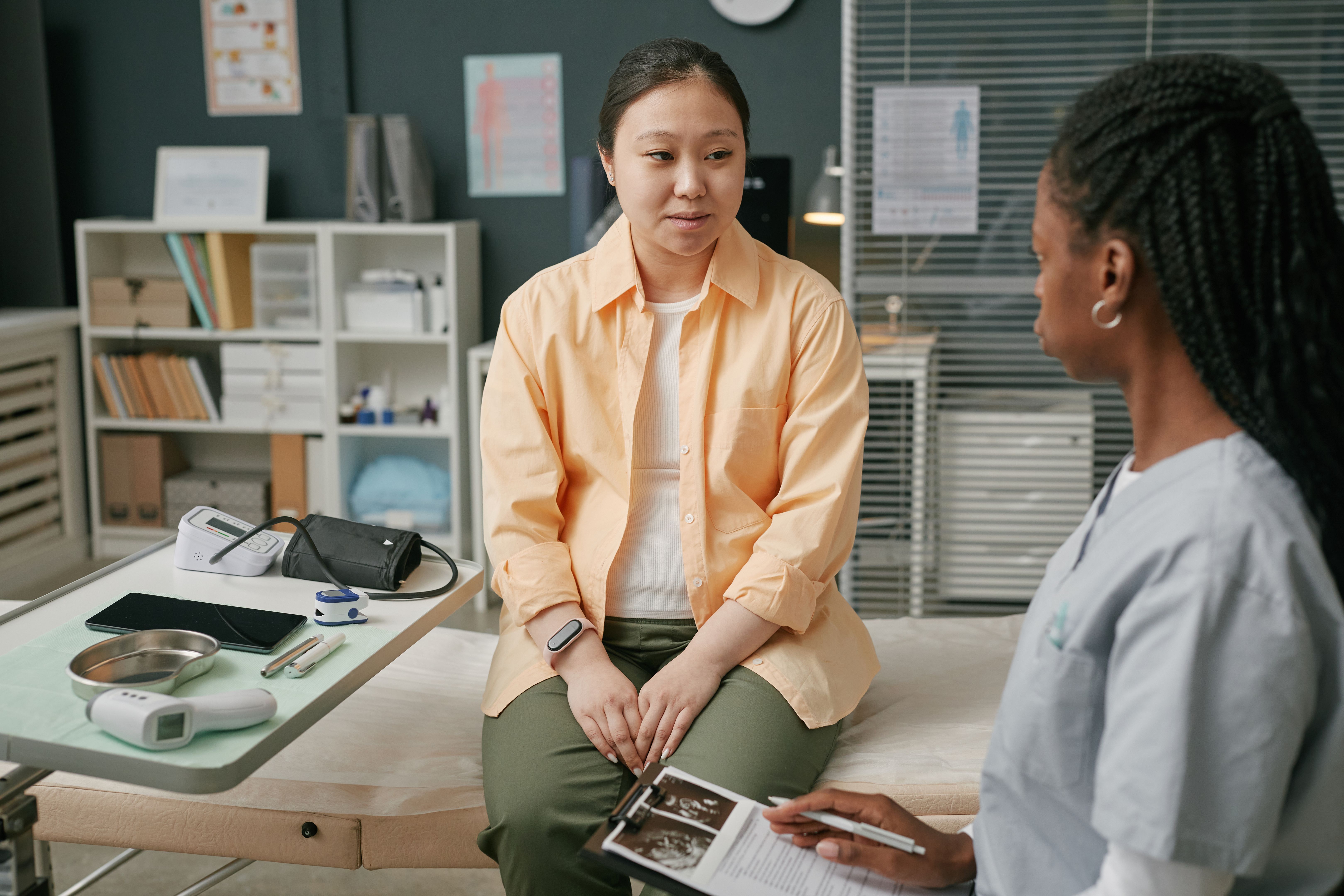 woman consulting doctor