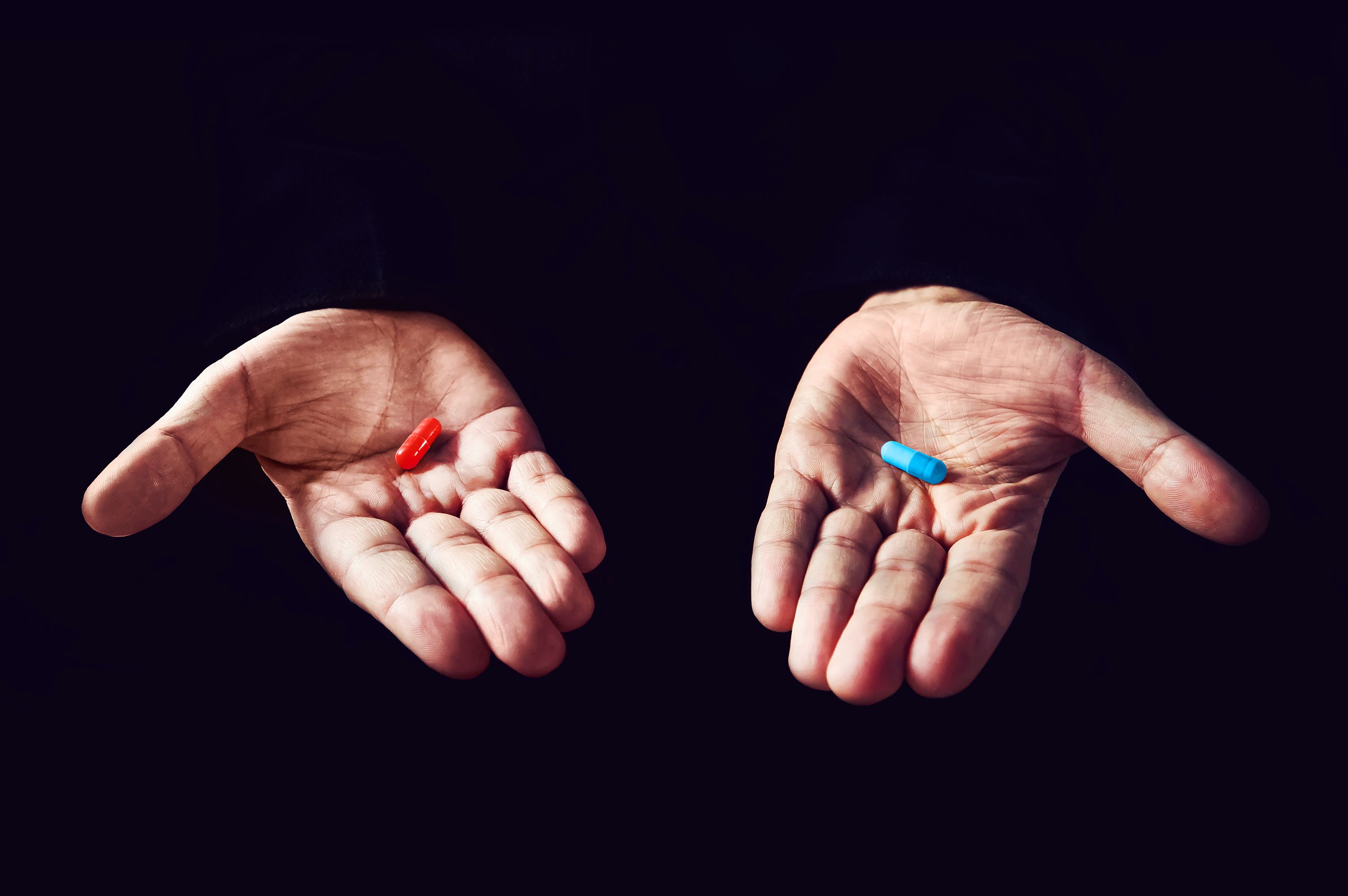Red Pill Blue Pill concept. The right choice the concept of the movie matrix. The choice of tablets