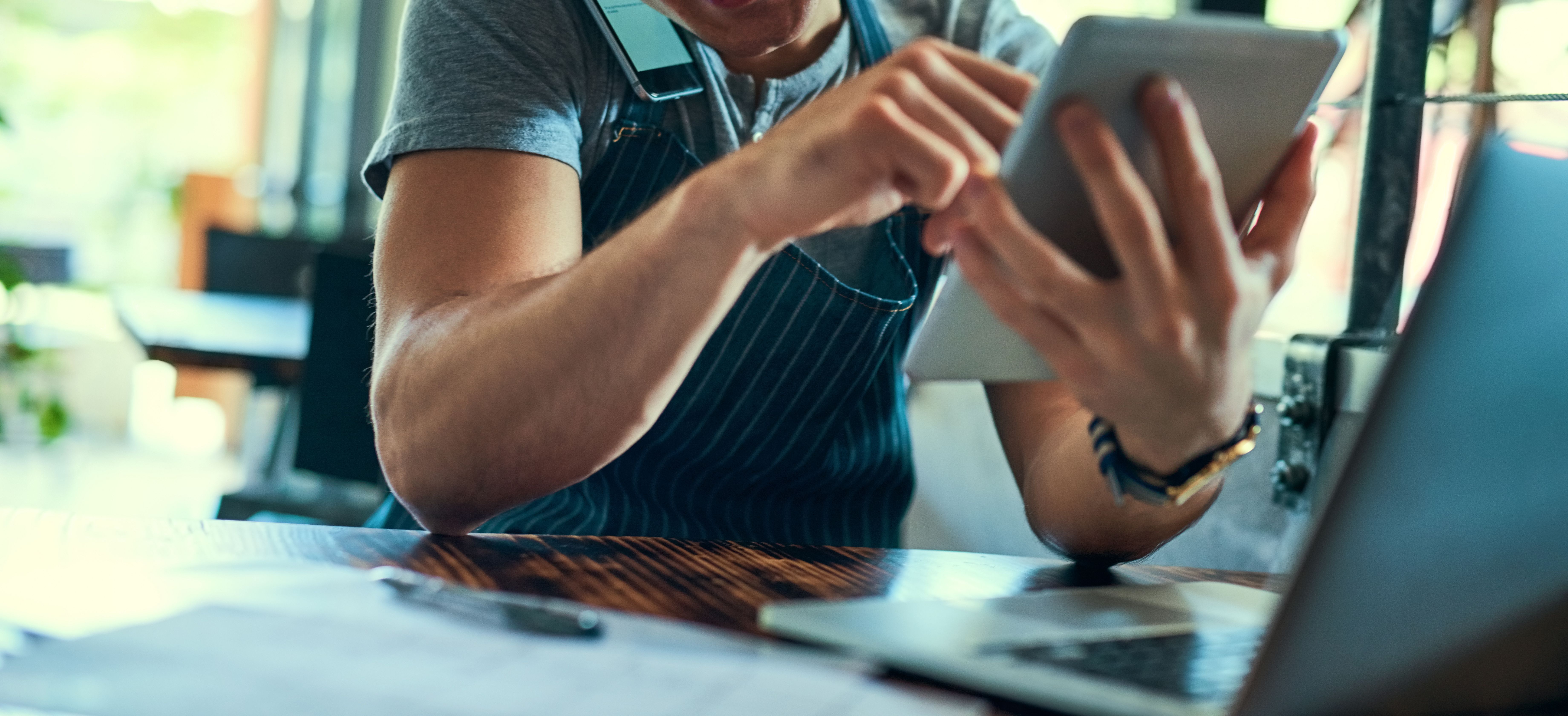 business owner using tech