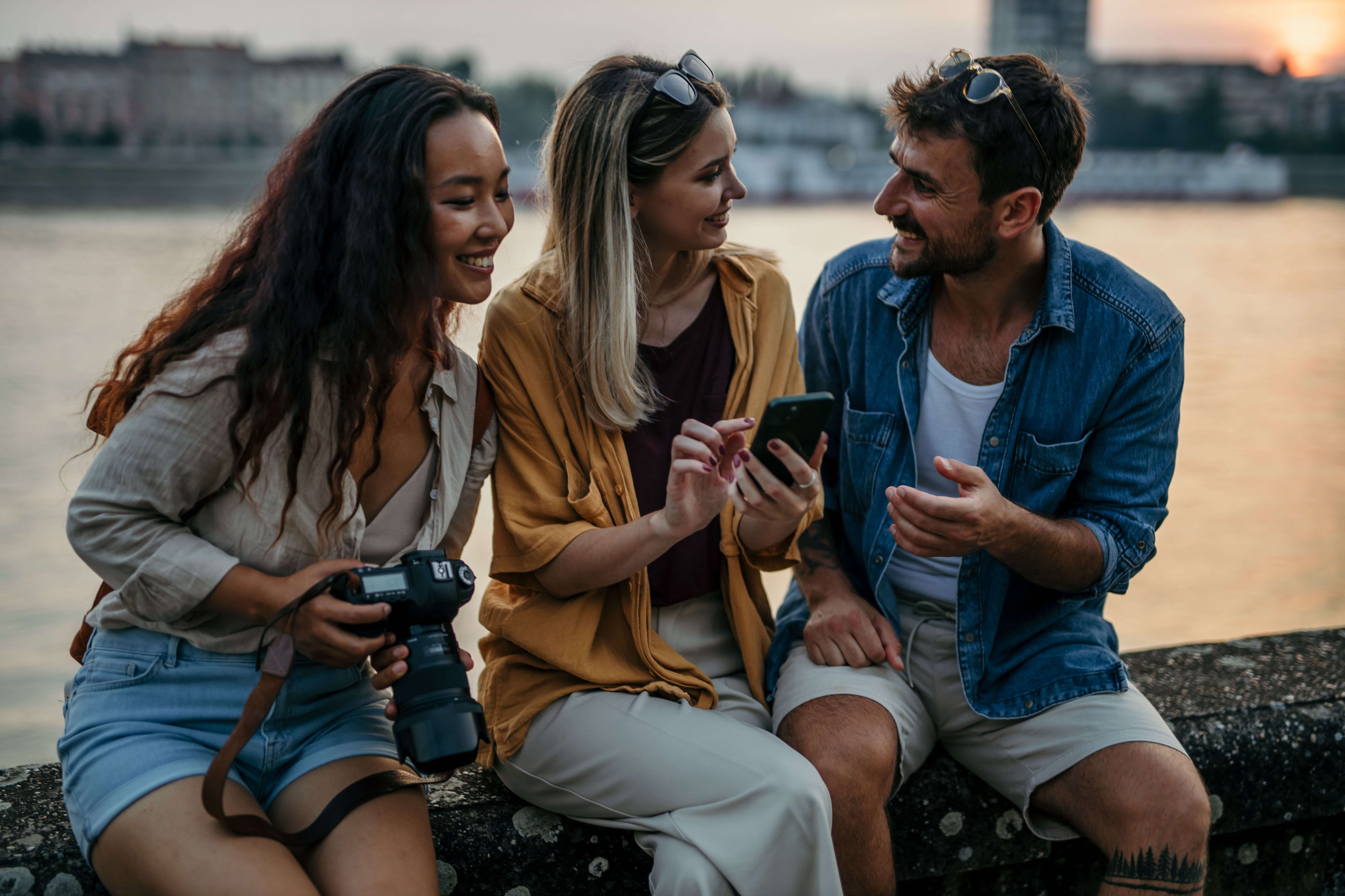 Socializing by the city skyline