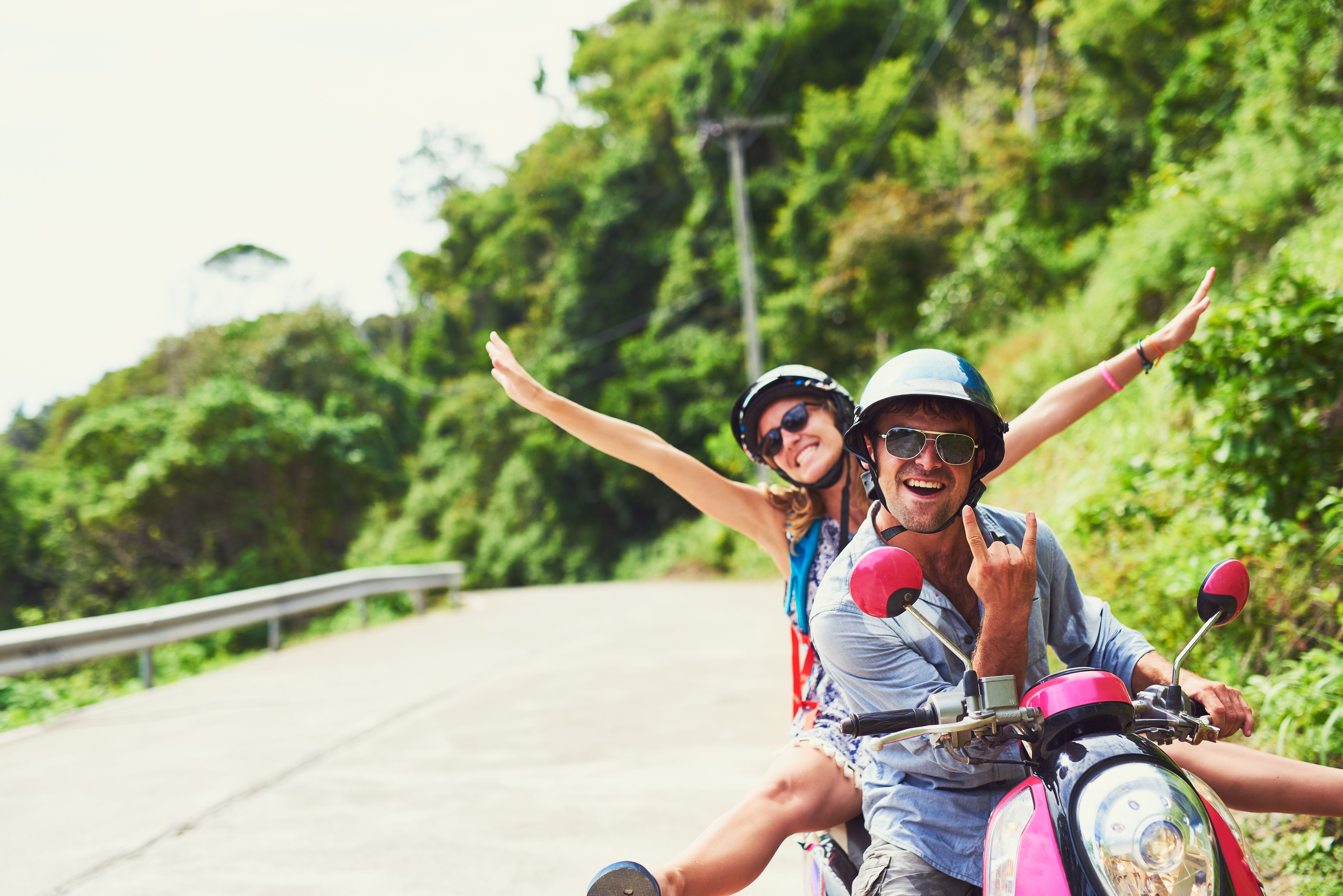 tourists on scooters