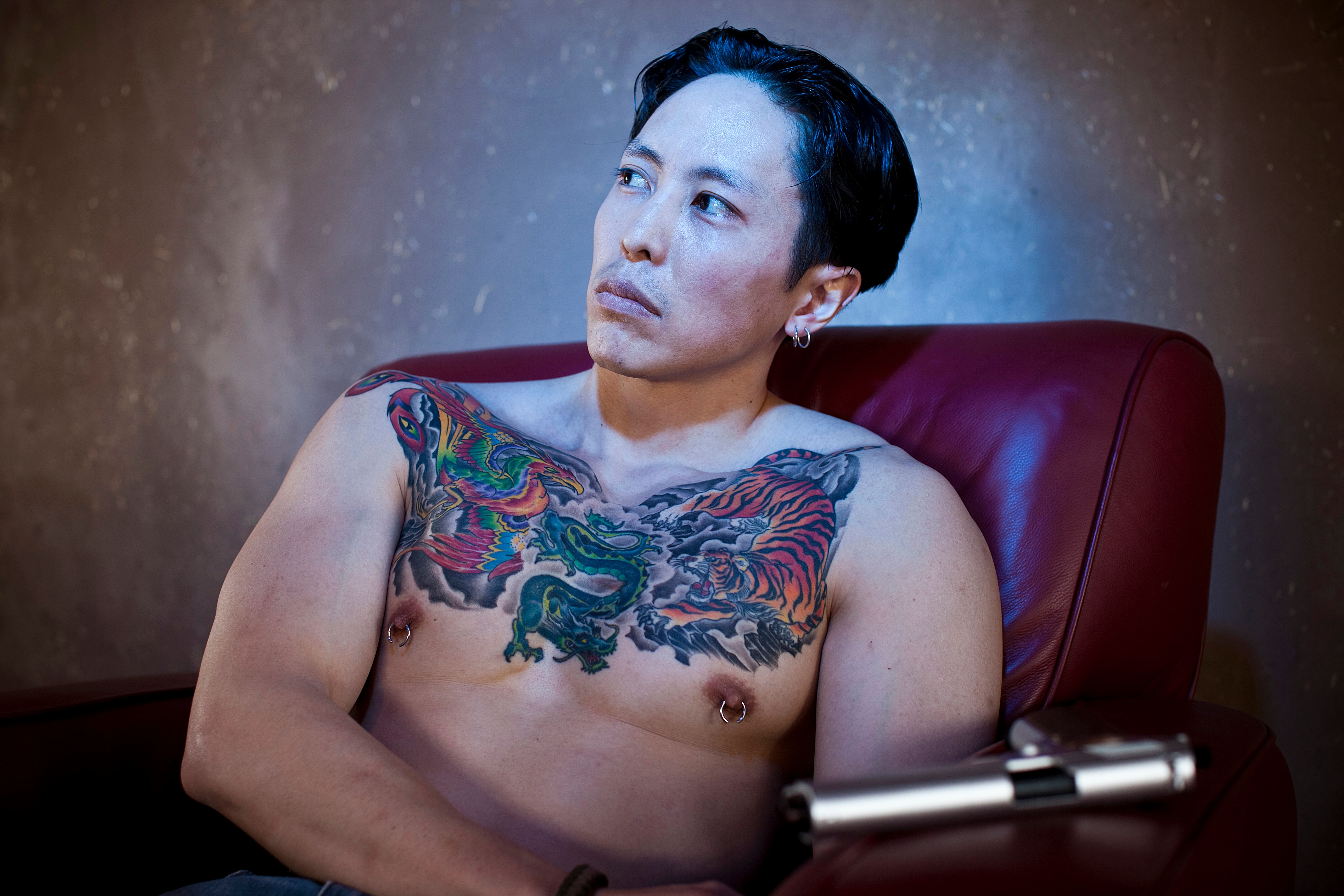 Tattoed Gangster with gun