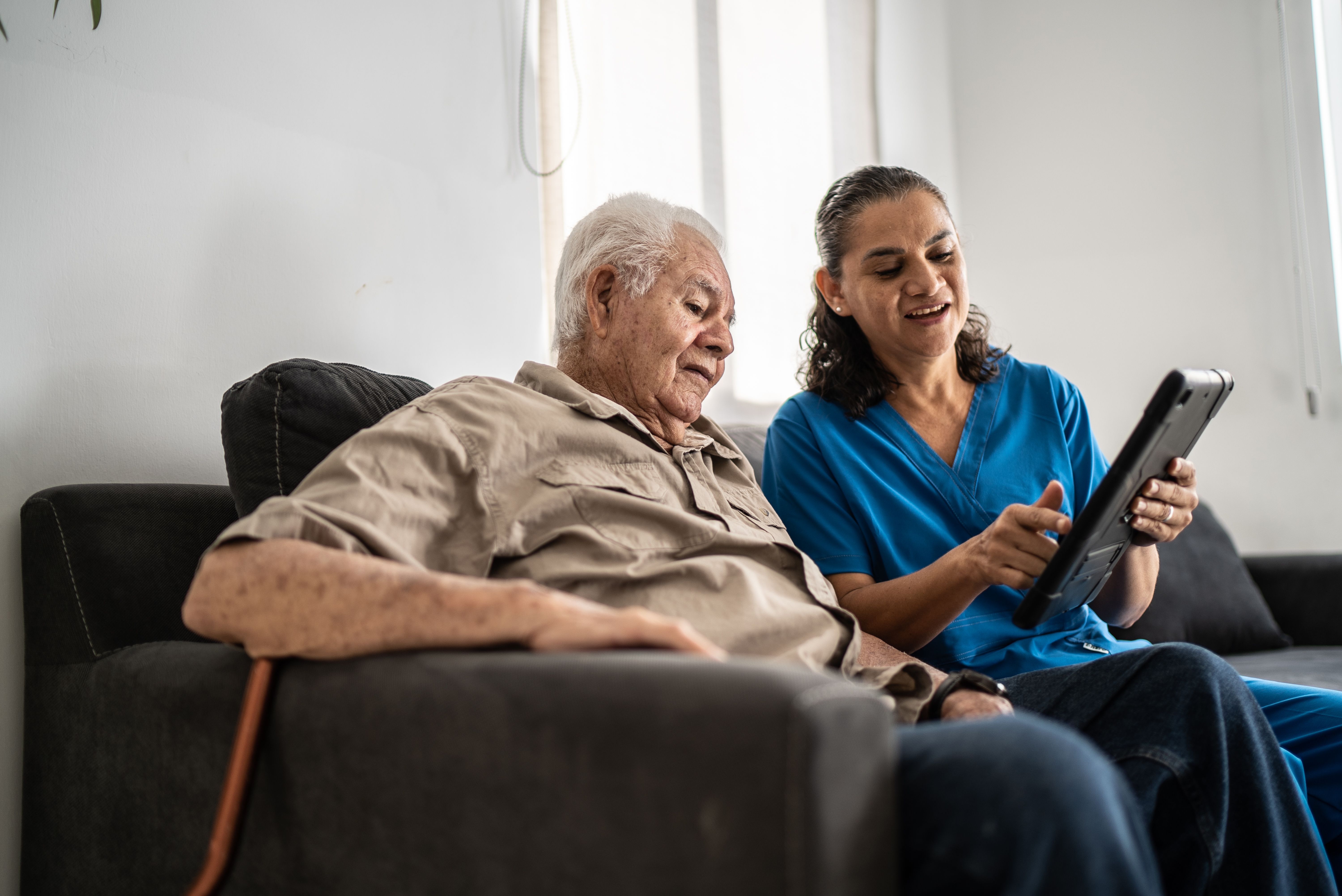 senior using tablet