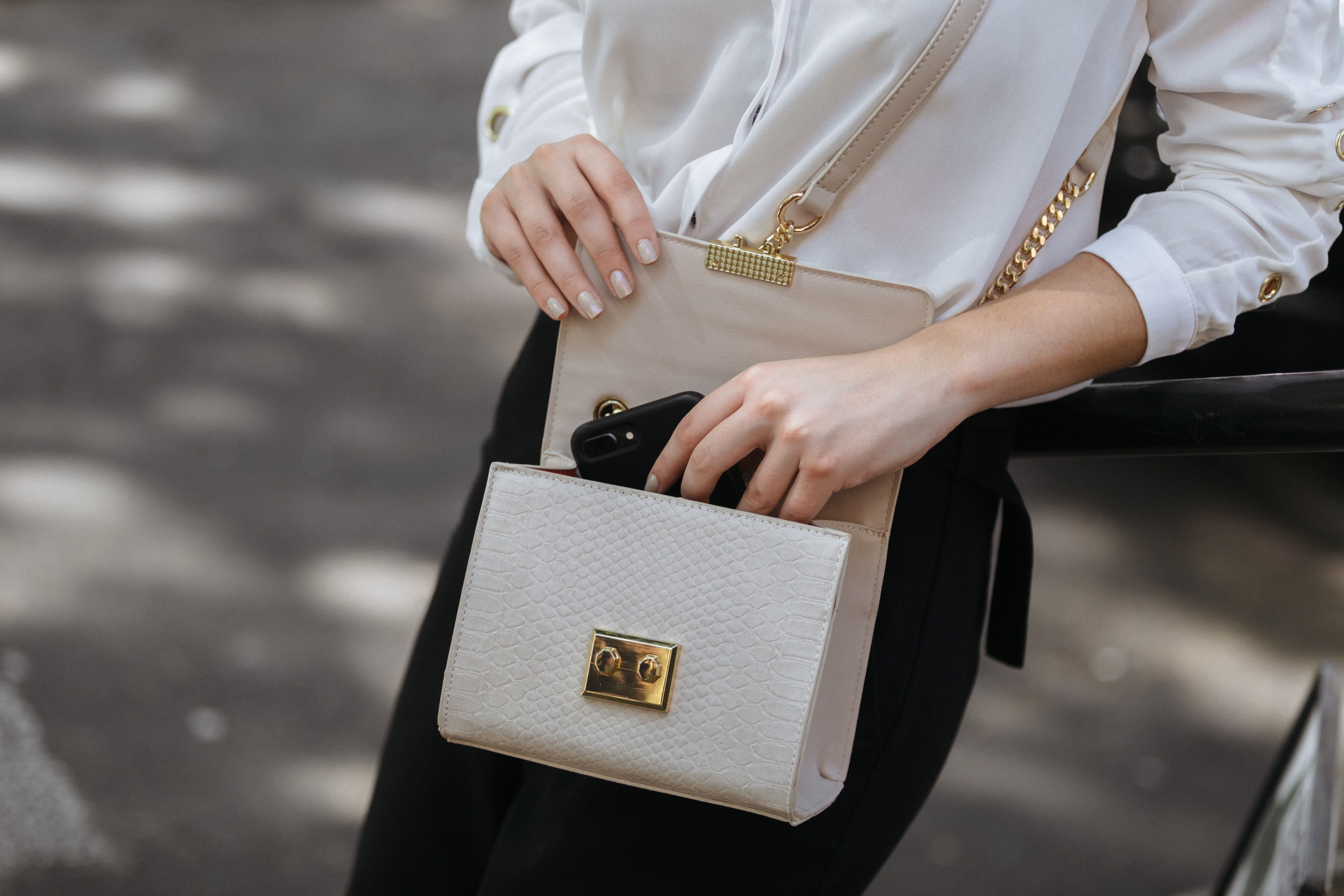 woman holding handbag