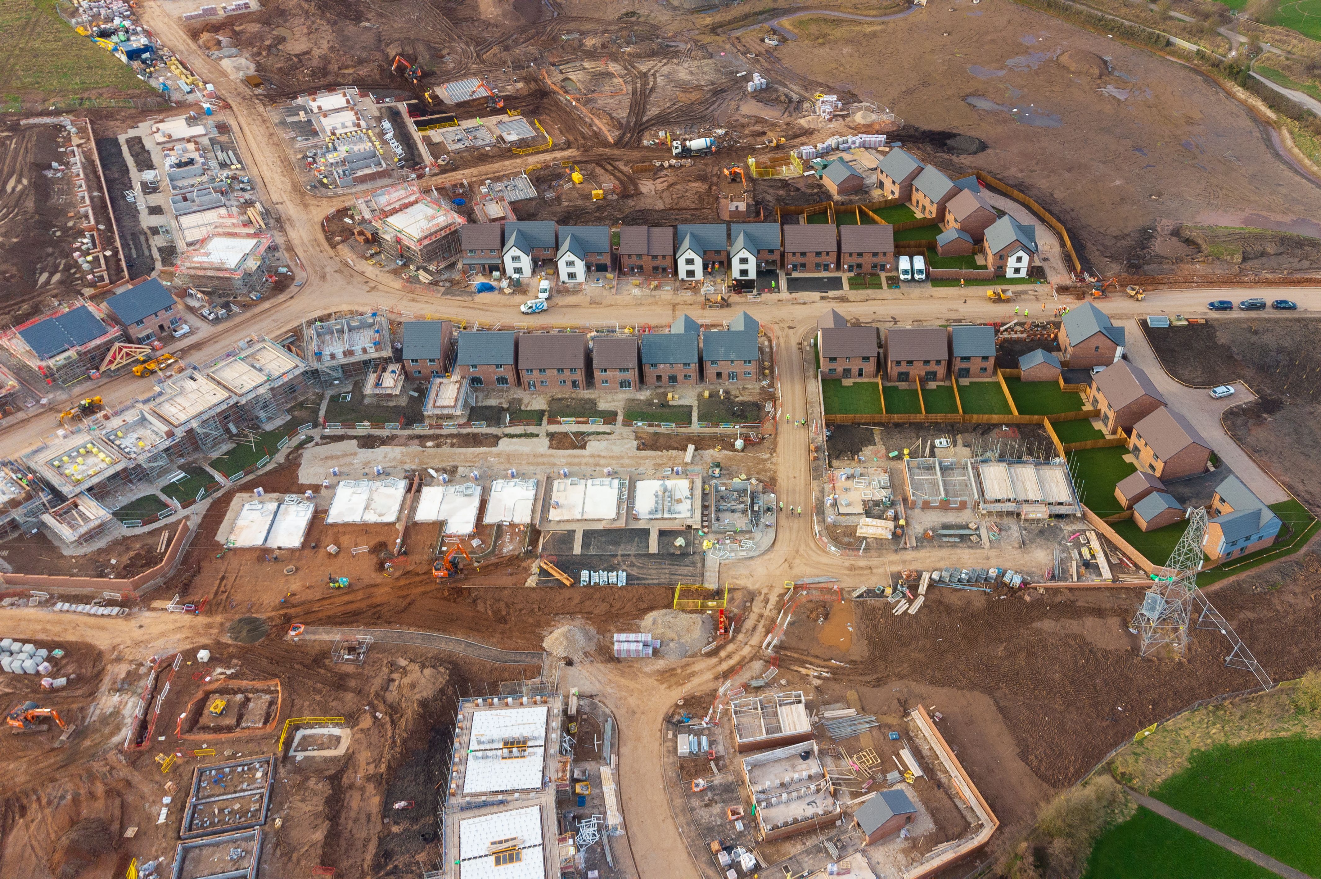 Aerial view of new build housing construction site in England, UK