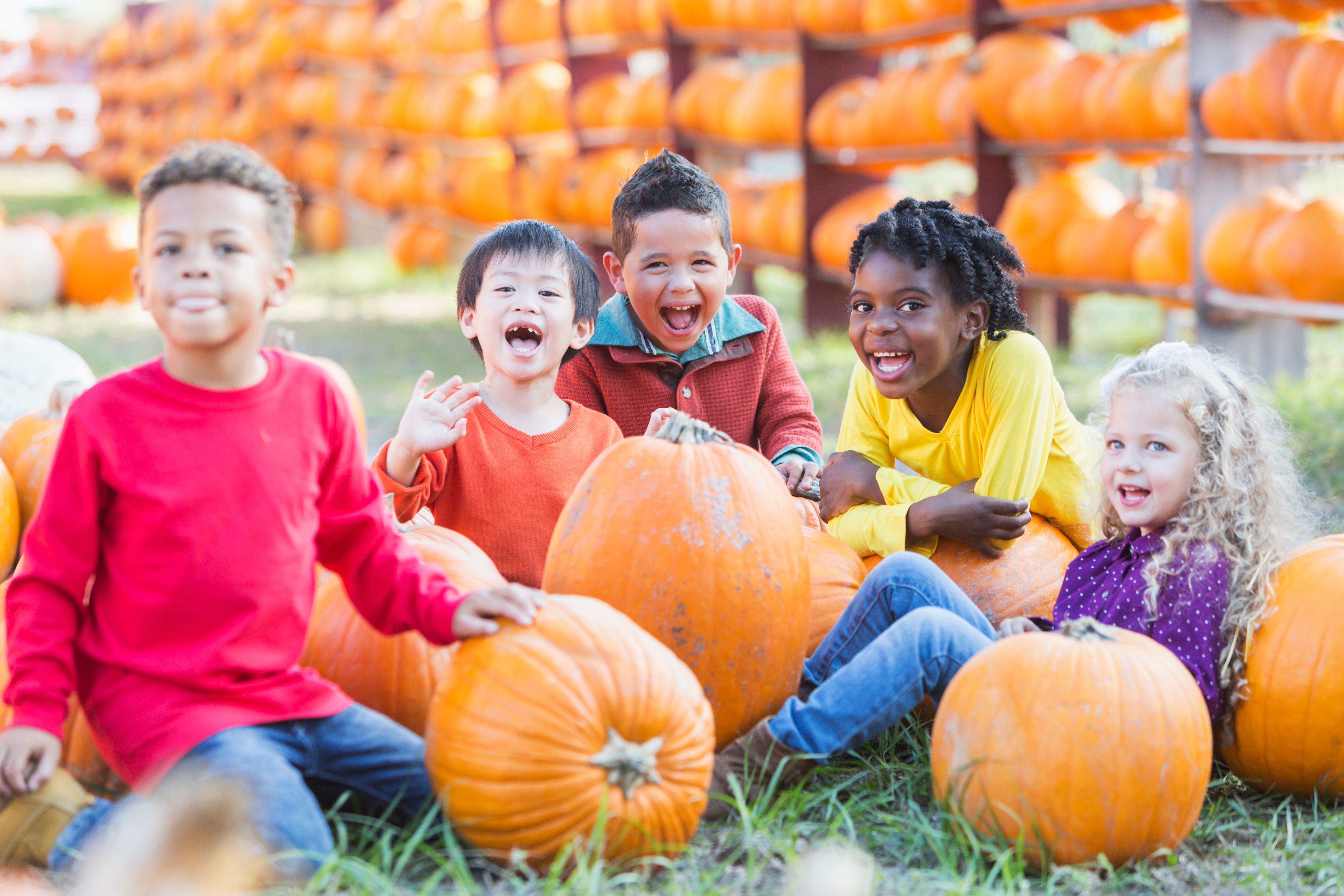 children with pumpkins