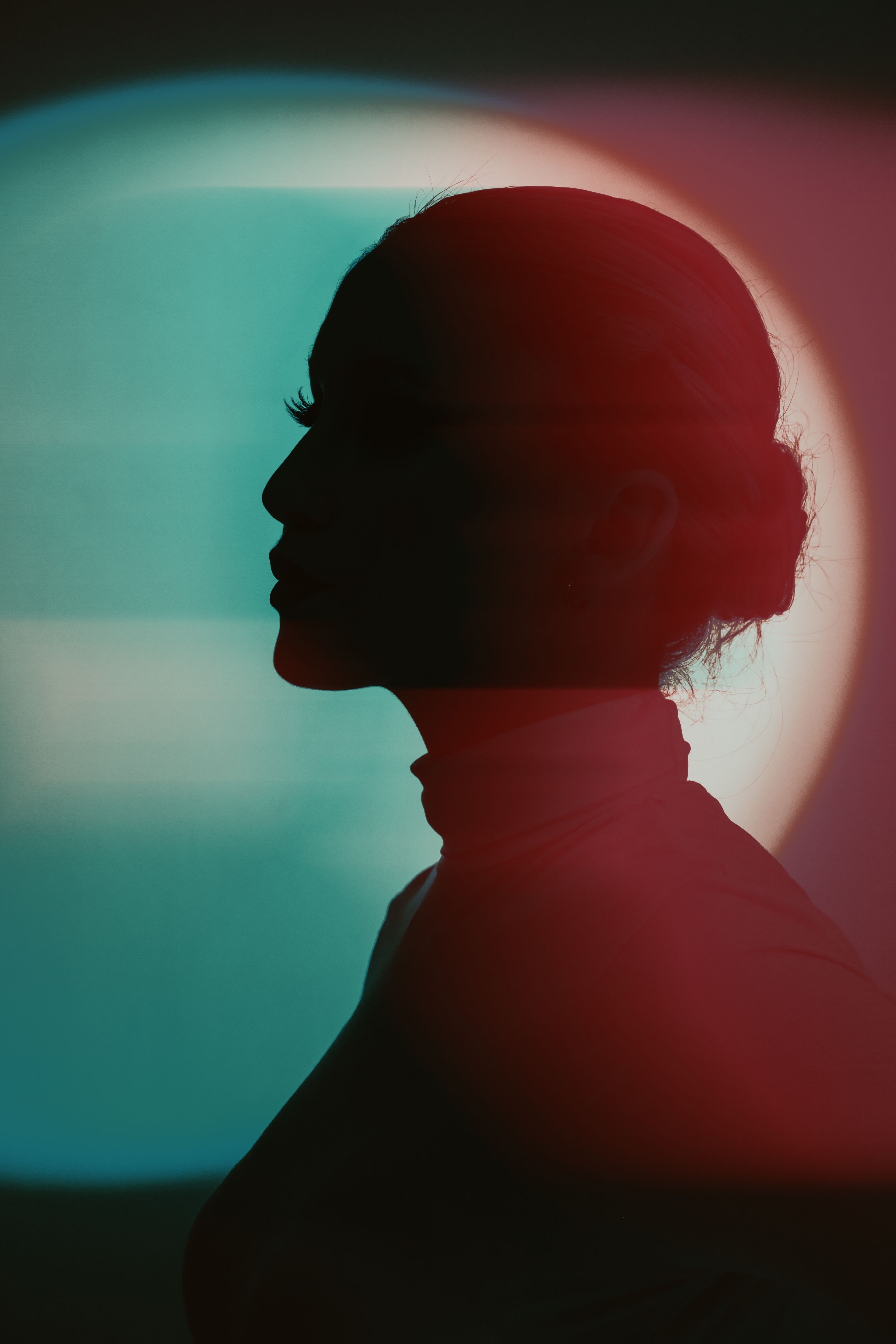 Woman profile black silhouette portrait in RGB color split effect style