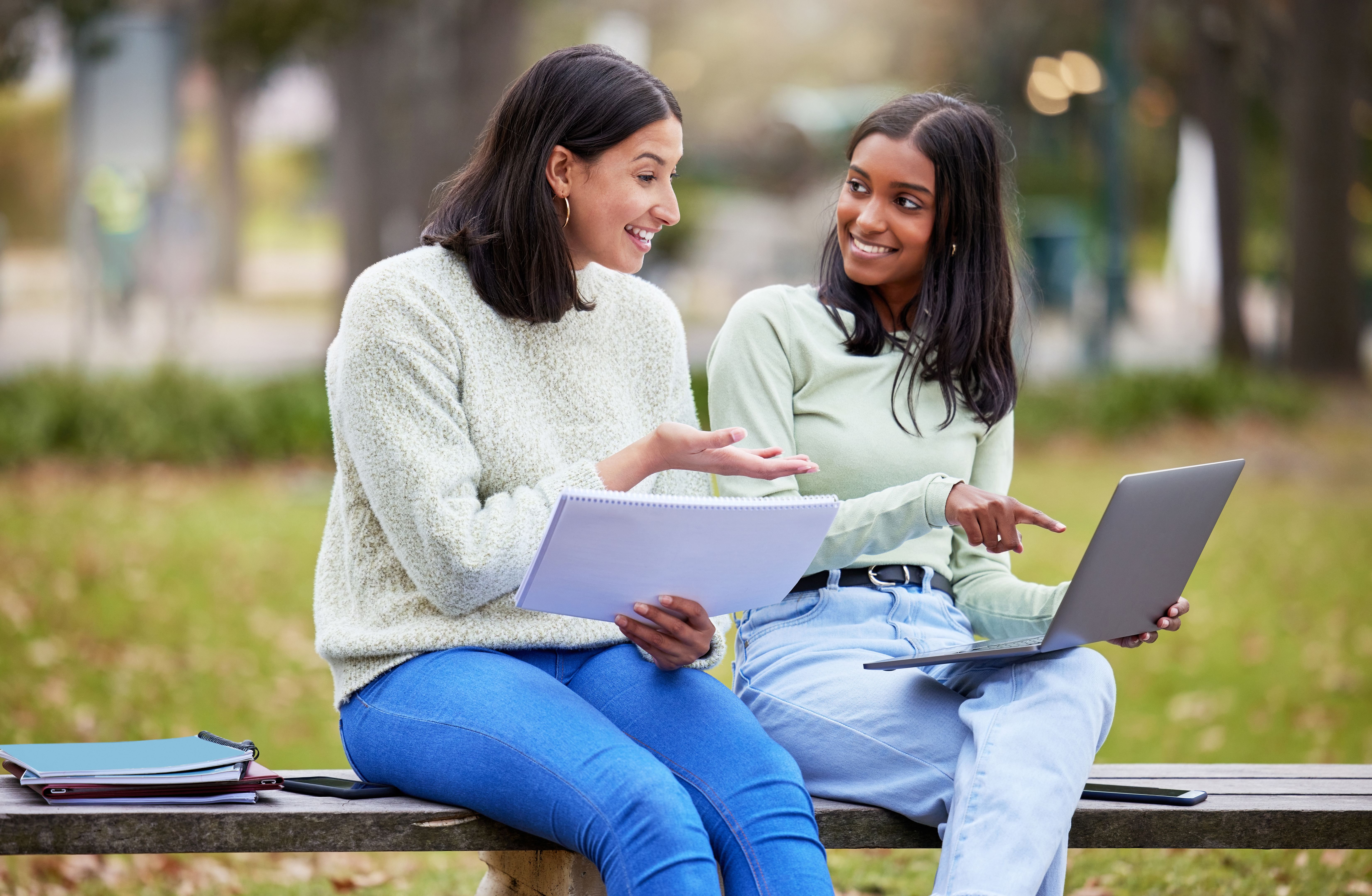 Shot of two young women studying together at college Shot of two young women studying together at college