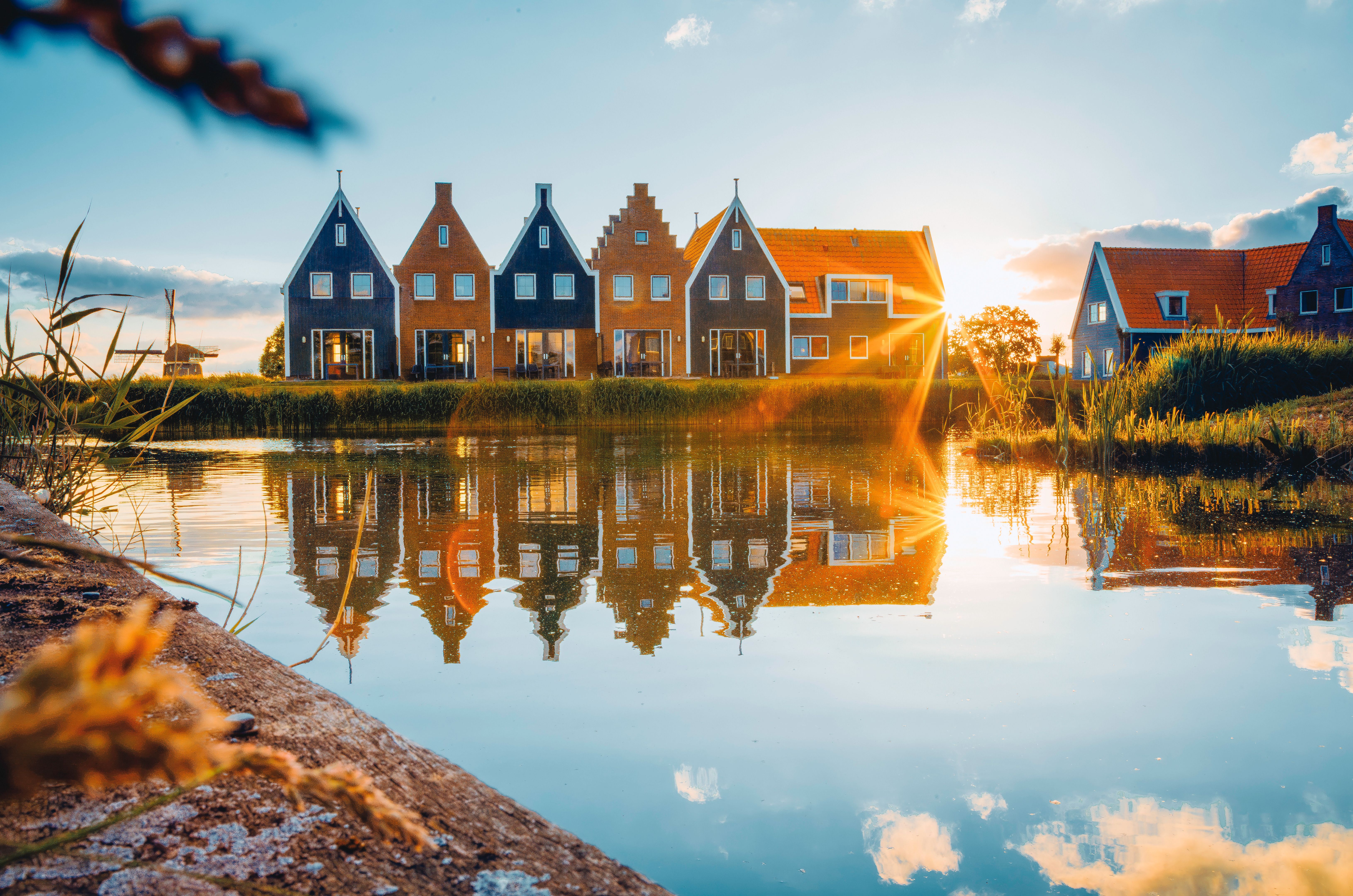 Colorful Reflections in Volendam: A Historical Dutch Village at Sunset