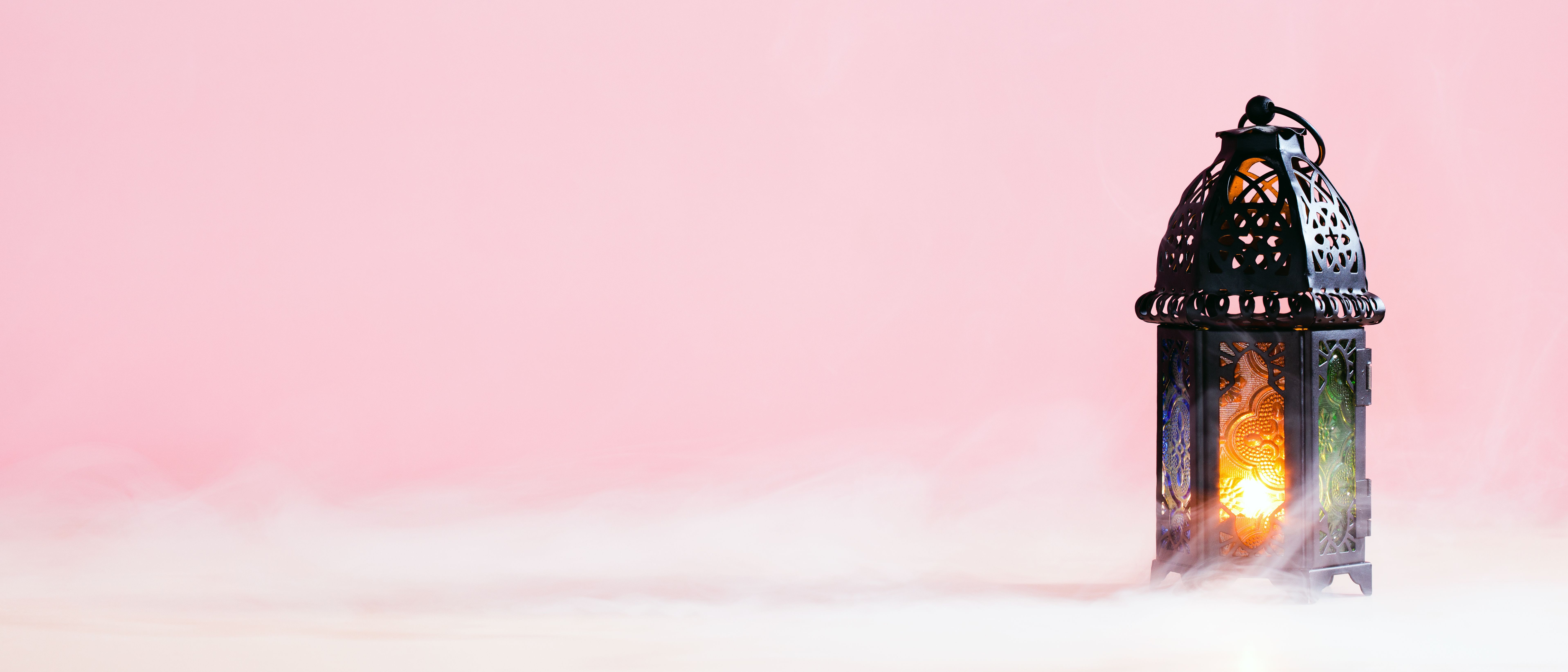 Ramadan Kareem banner design with lantern on pastel pink background with smoke. Eid Mubarak, Muslim Holy Month greeting card template. Ramadan Kareem banner design with lantern on pastel pink background with smoke. Eid Mubarak, Muslim Holy Month greeting card template.