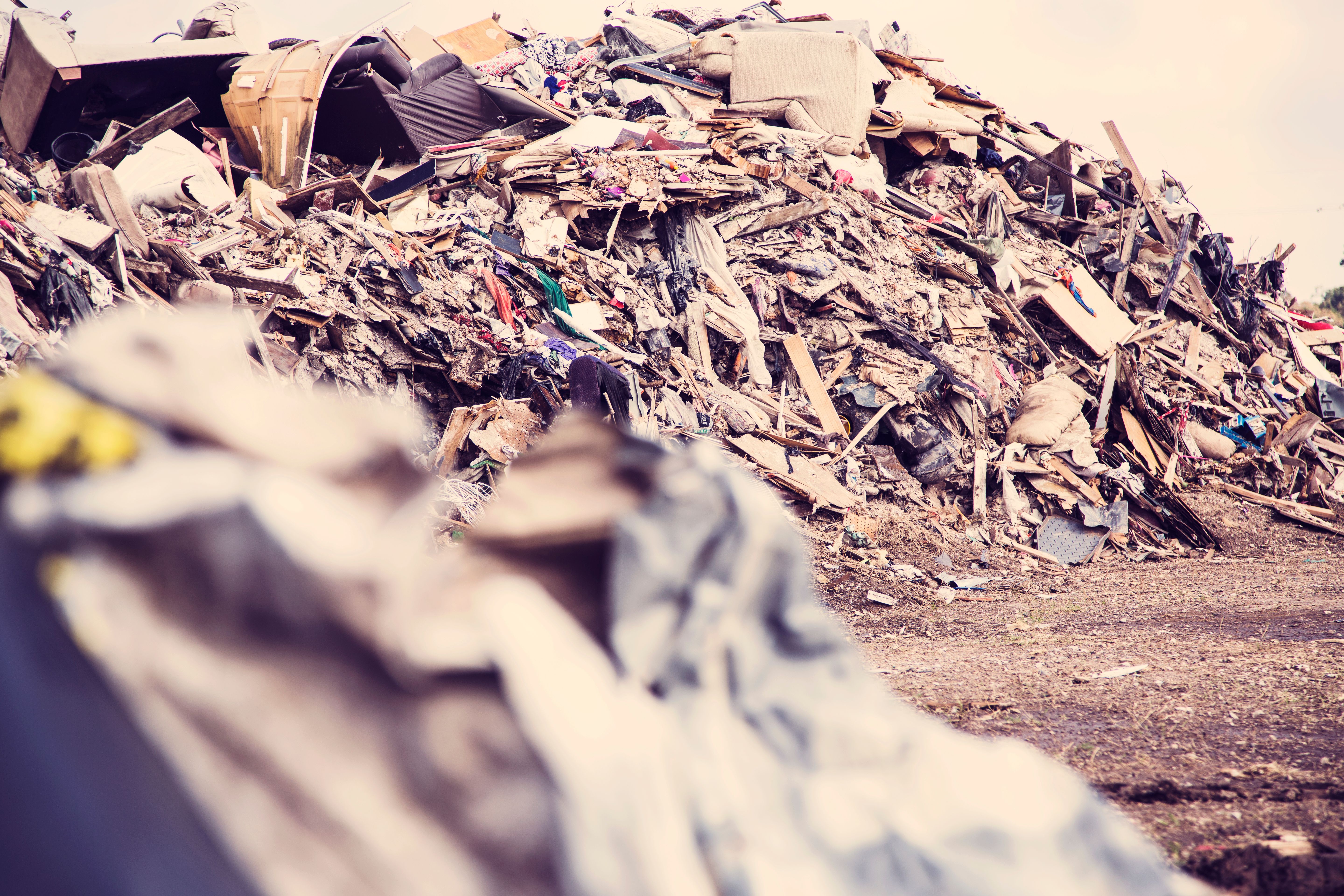 Aftermath of hurricane natural disaster garbage, debris dump site.