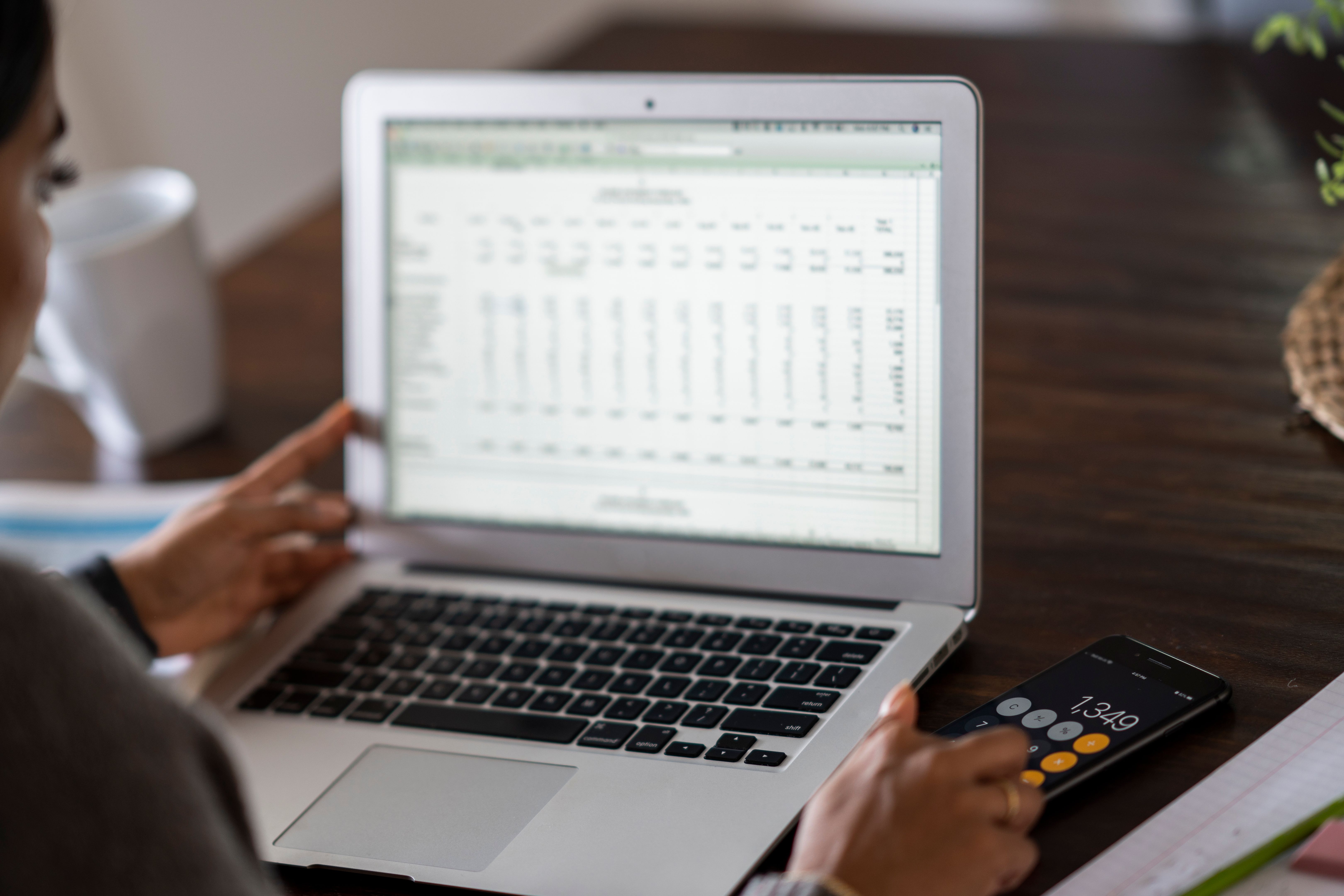 Young Adult Reviewing Finances Young Adult Reviewing Finances