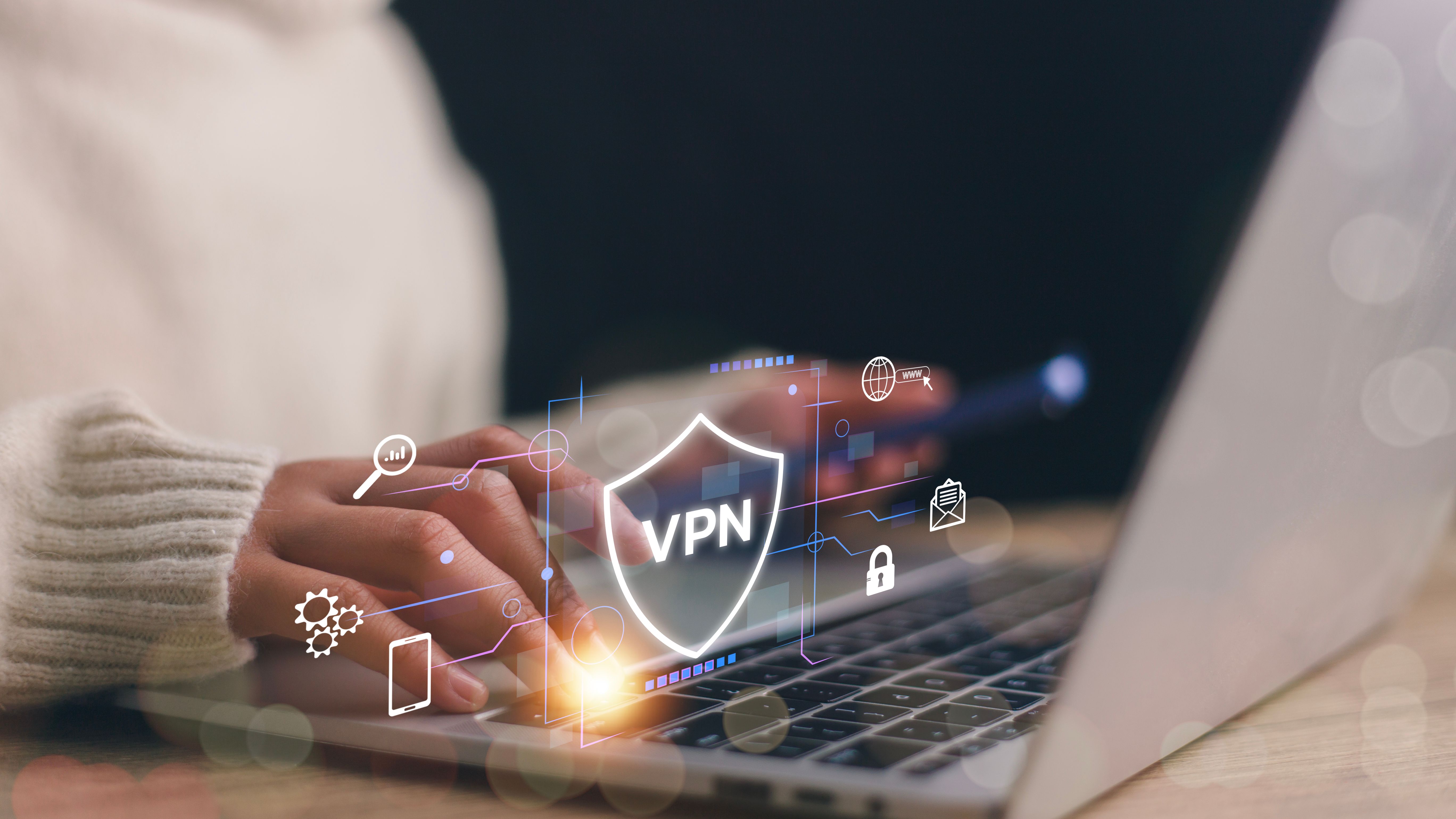 VPN Virtual Private network protocol concept, Women use a laptop with a futuristic virtual interface screen of a VPN icon to connect to the VPN network. VPN Virtual Private network protocol concept, Women use a laptop with a futuristic virtual interface screen of a VPN icon to connect to the VPN network.