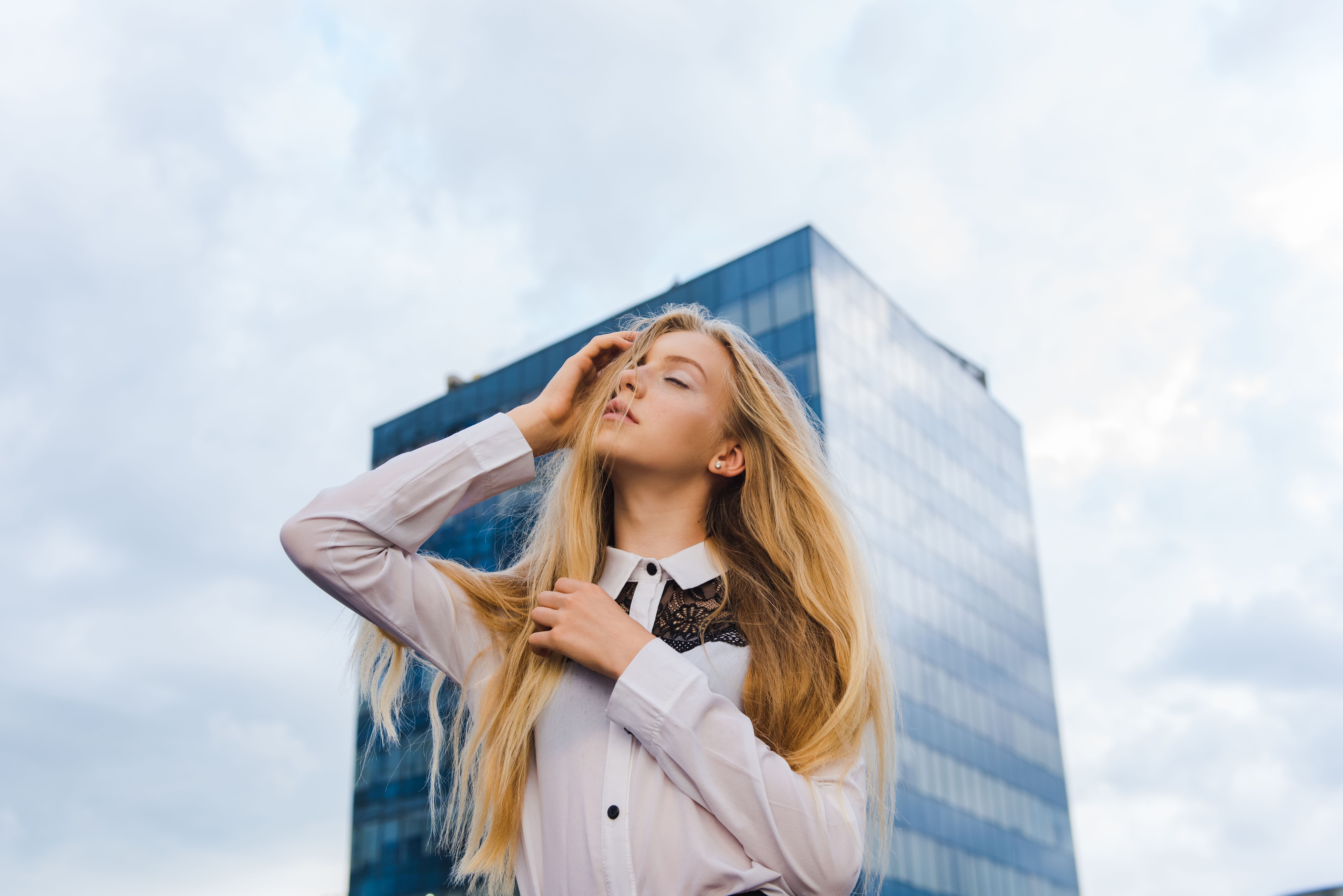 Fashion portrait of girl at downtown background Fashion portrait of girl at downtown background