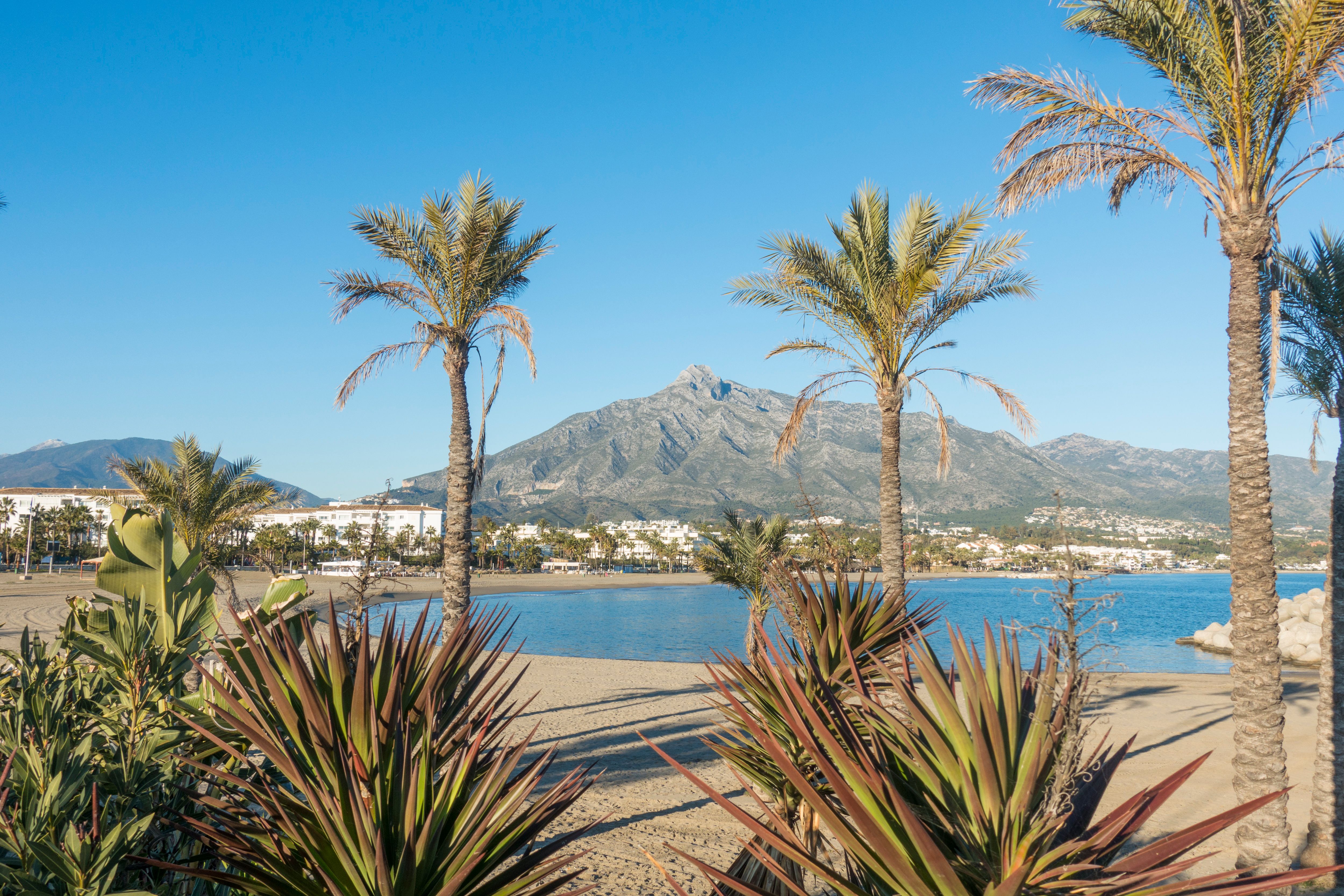 Beautiful Puerto Banus beach with La Concha Mountain background in Spain