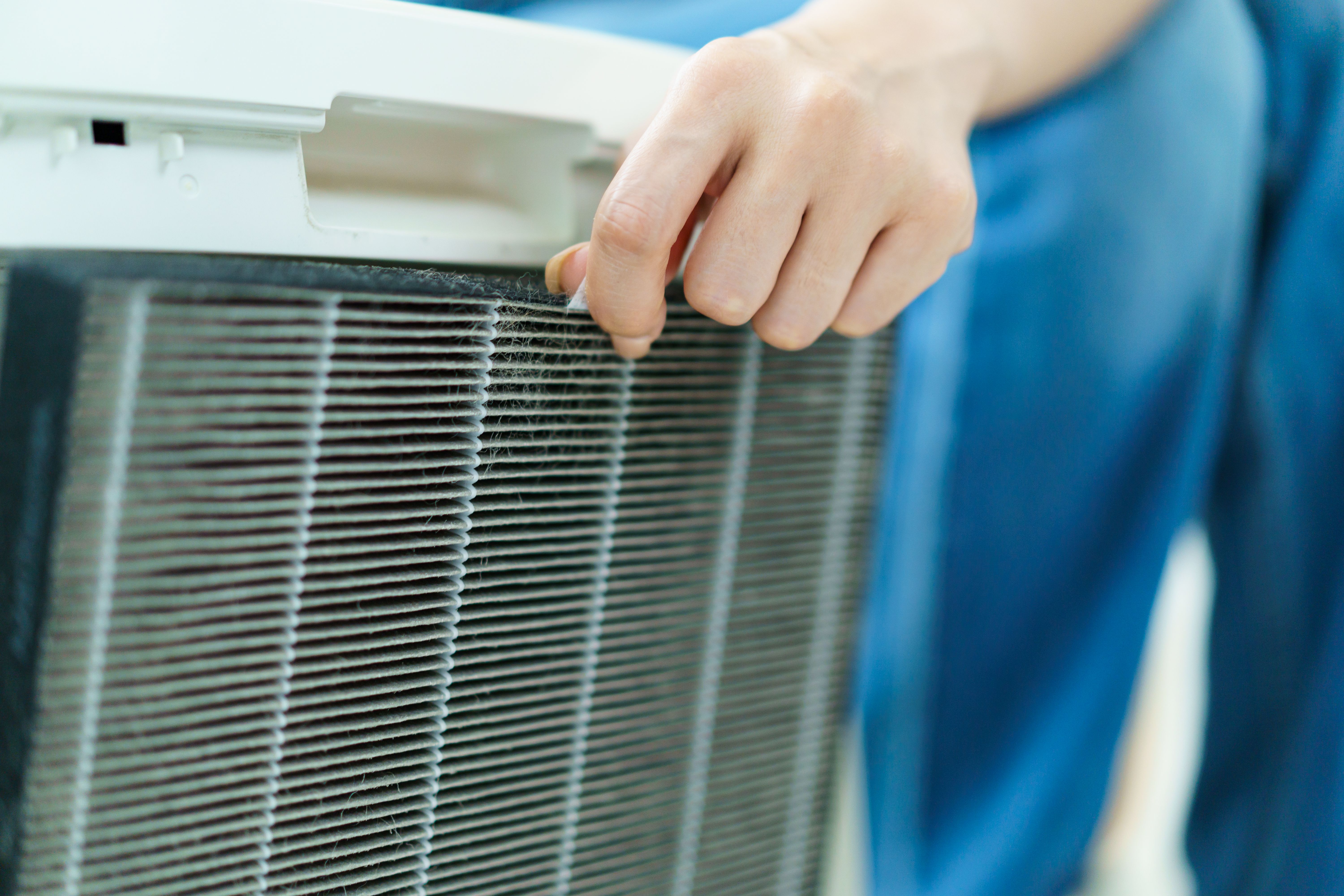 person changing filter