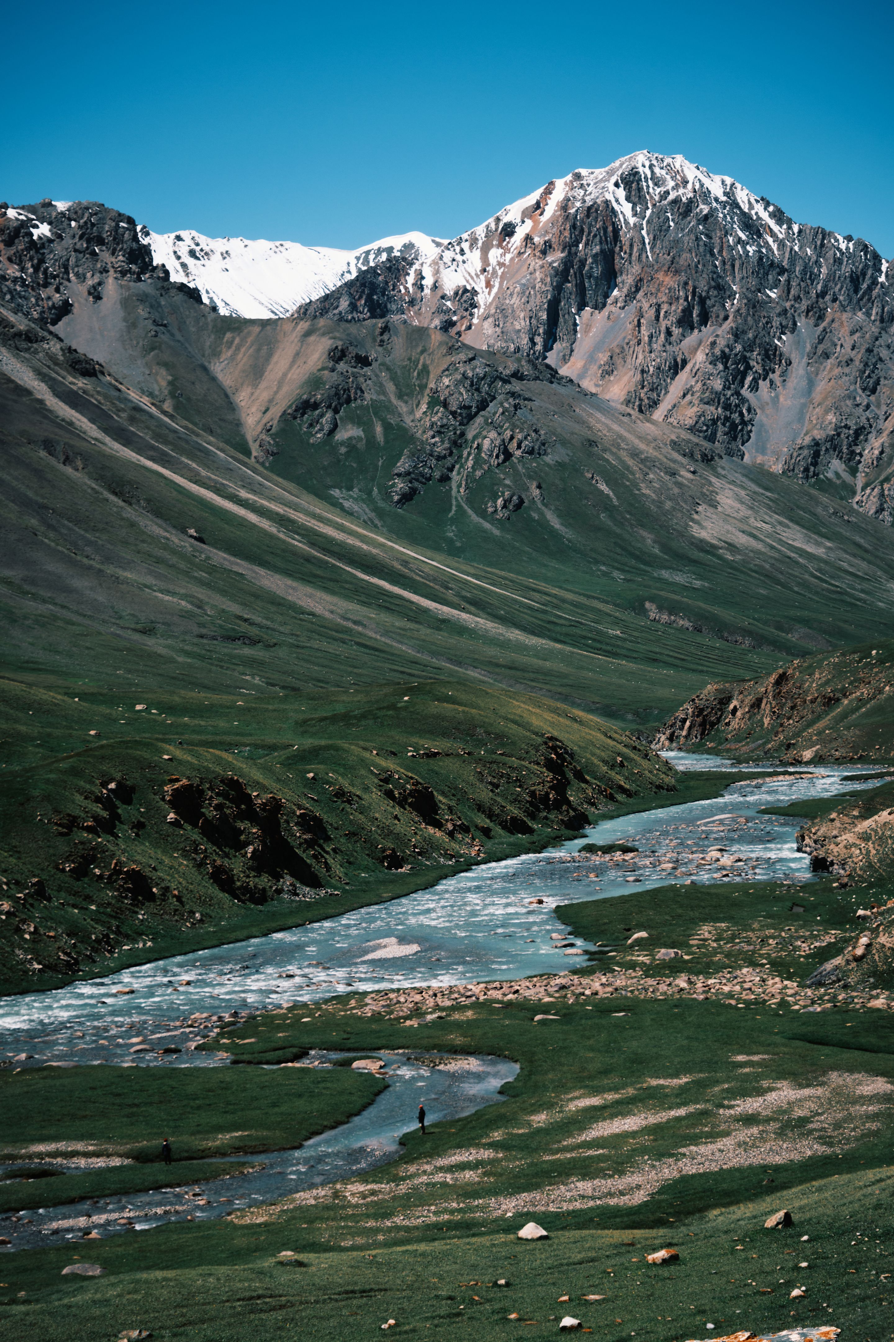 Majestic view of green mountains above picturesque river valley