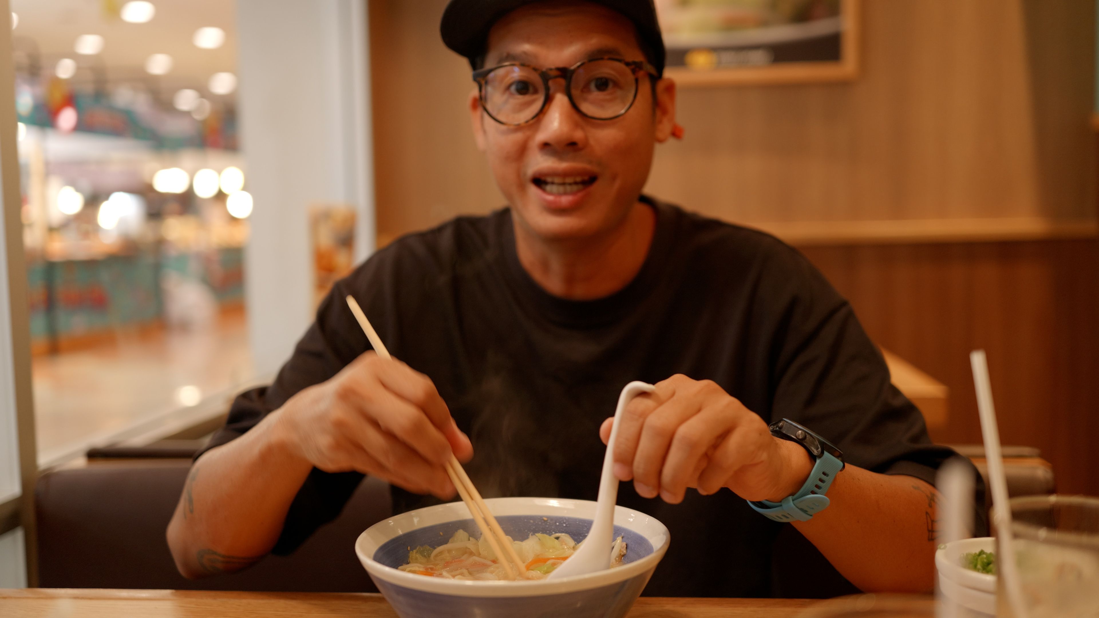 Asian hungry man eating noodle ramen.