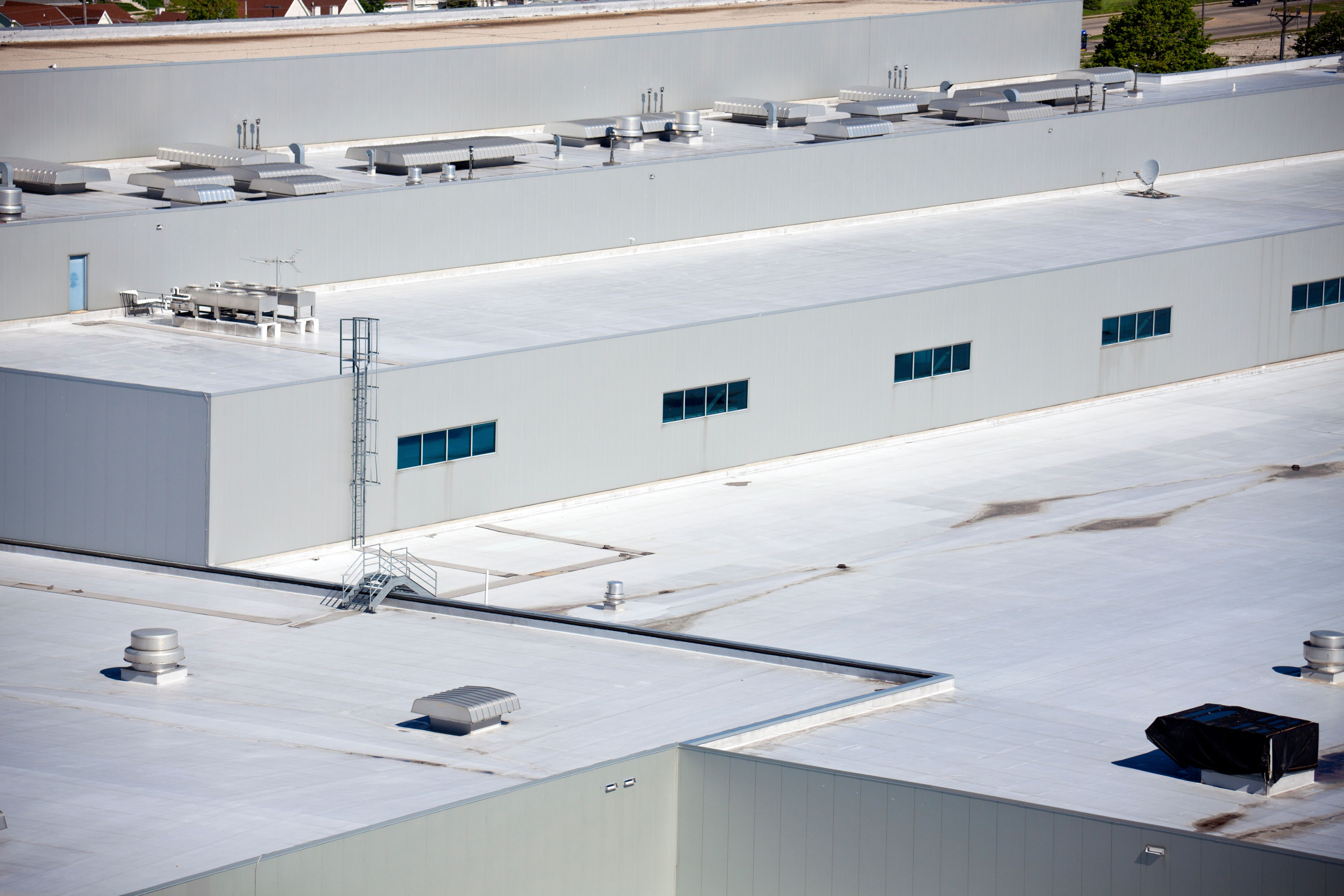 Close-up of the roof of big warehouse building