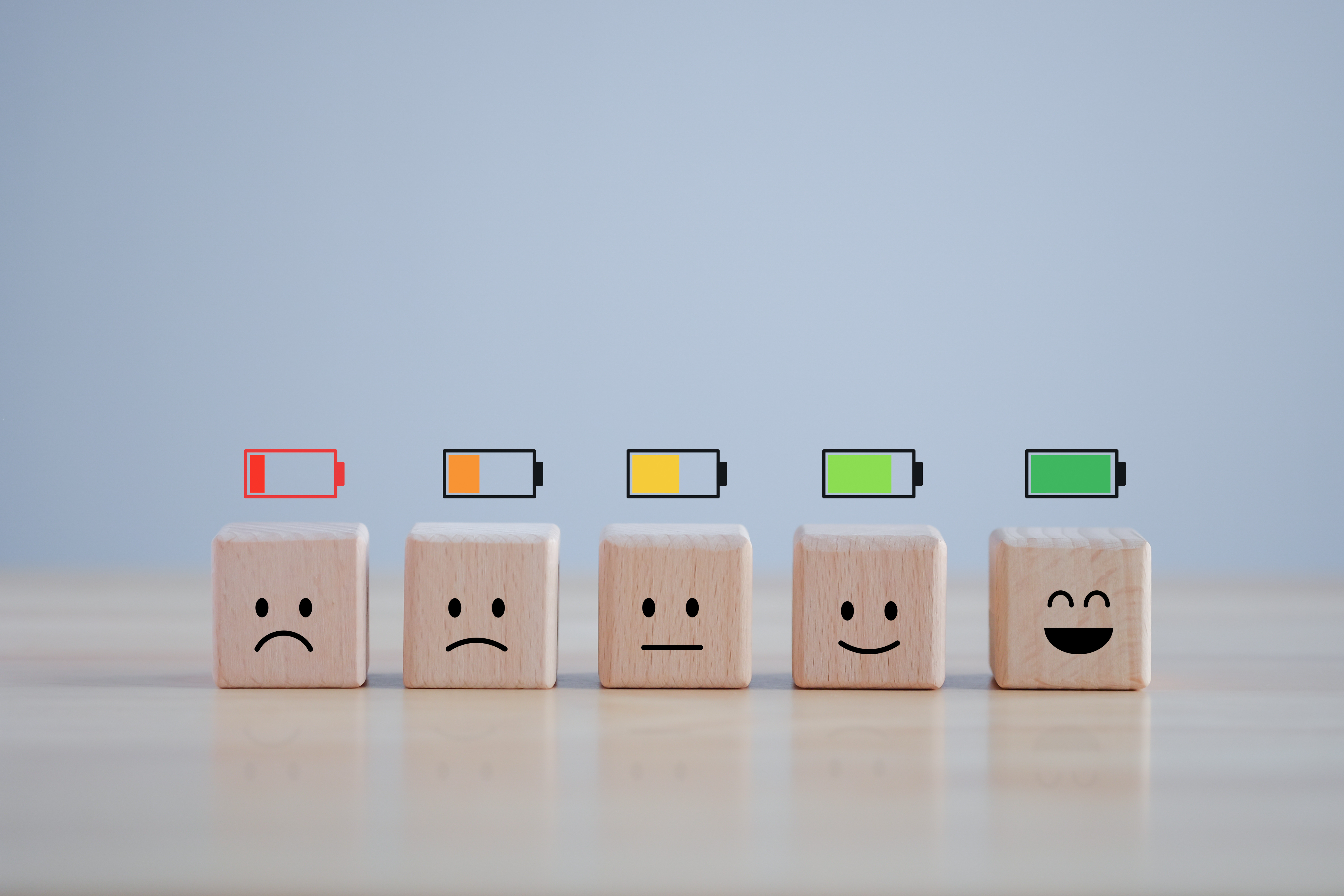 Level of low battery with sadness face to full battery with happy smile face. Energy life, Emotion Level, World mental health day, Passion, Happy Life, Satisfaction, Full energy and Positive thinking. Level of low battery with sadness face to full battery with happy smile face. Energy life, Emotion Level, World mental health day, Passion, Happy Life, Satisfaction, Full energy and Positive thinking.