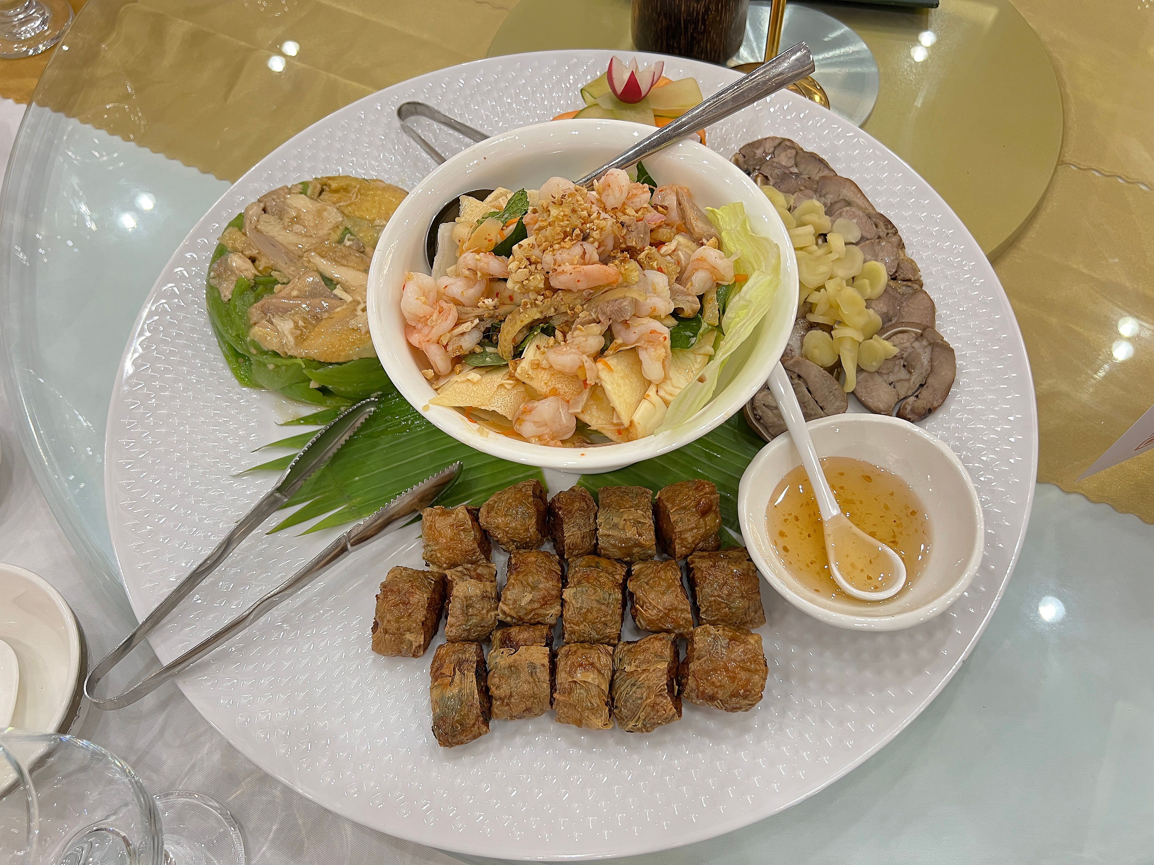 A platter comprising an assortment of appetizers for Chinese banquet-style dining