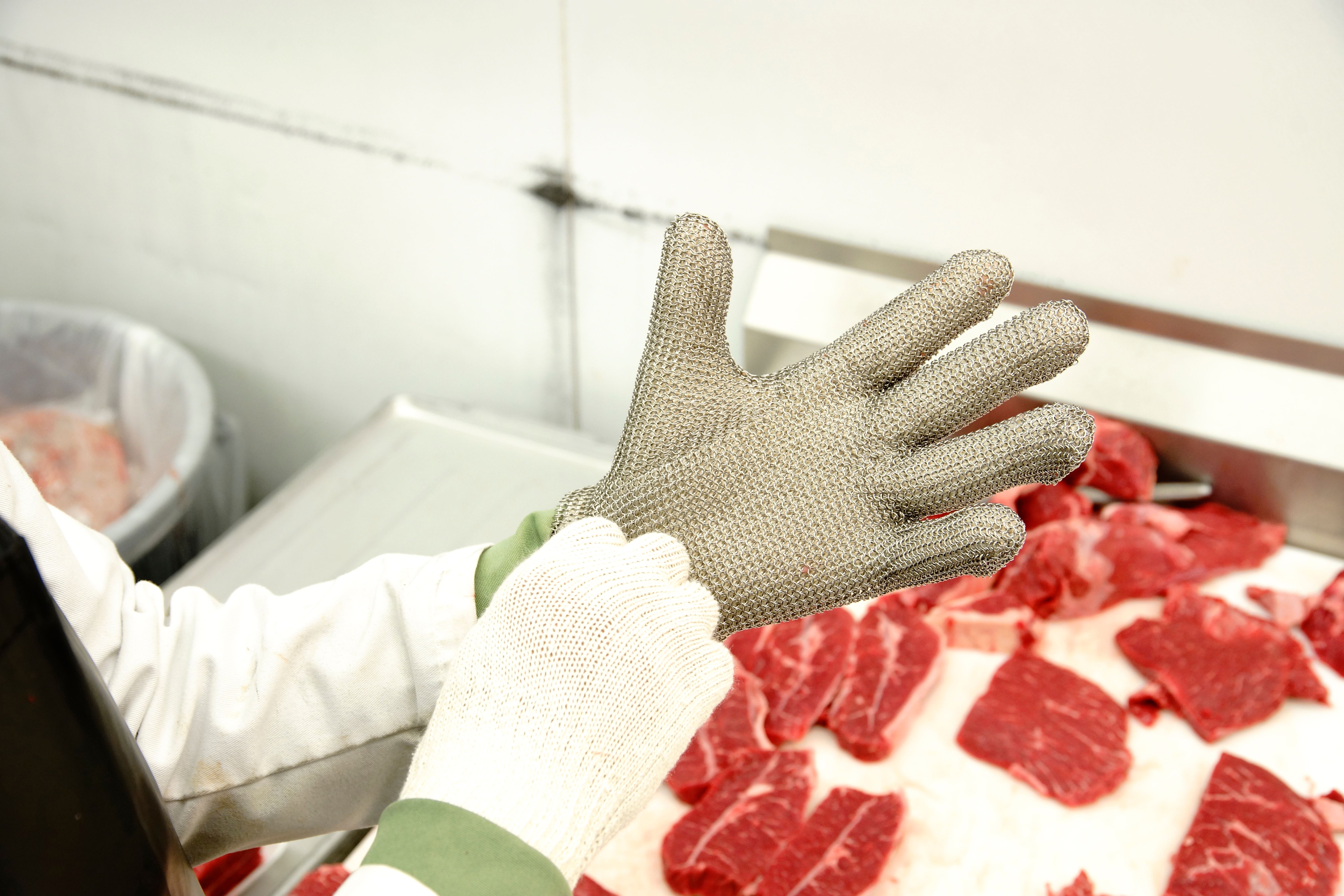 butcher using gloves