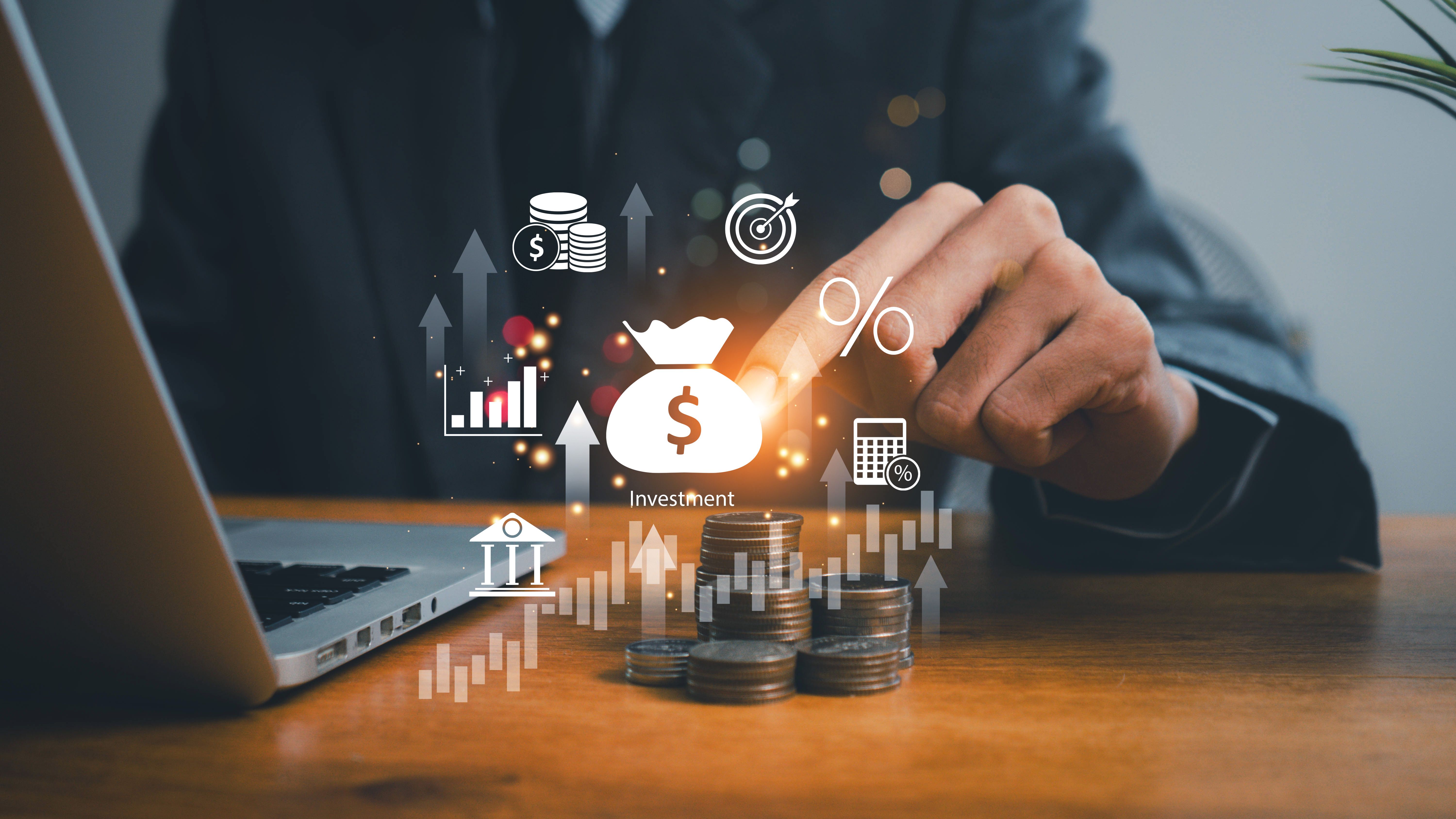 finance and investment concept, invest money, fundraising, ROI return on investment, Interest rate and dividend concept, Businessman is calculating income and return on investment in percentage.