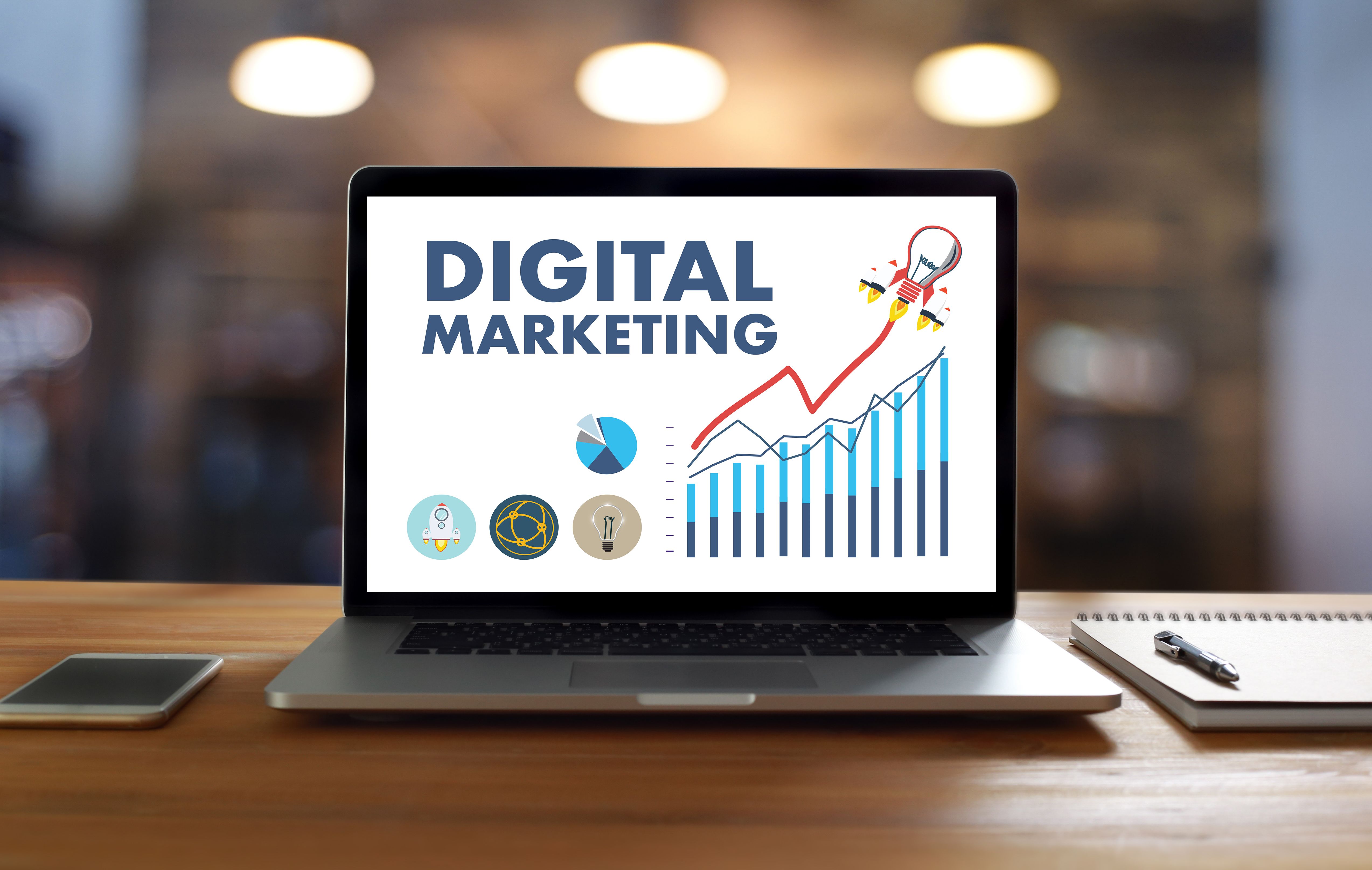 DIGITAL MARKETING new startup project MILLENNIALS Business team hands at work with financial reports and a laptop