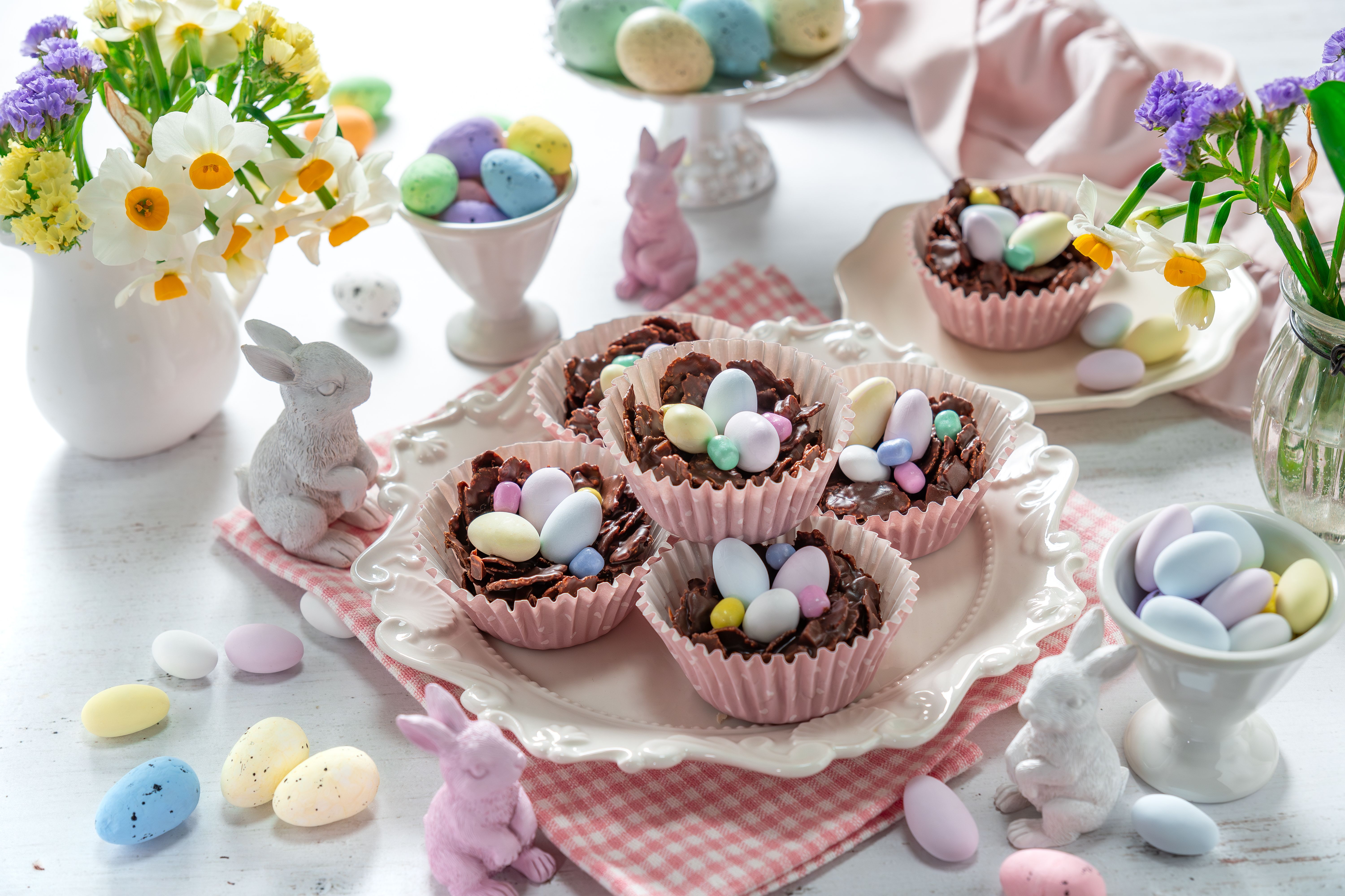 Easter egg nest cakes, cornflakes covered in milk chocolate topped with a miniature easter egg