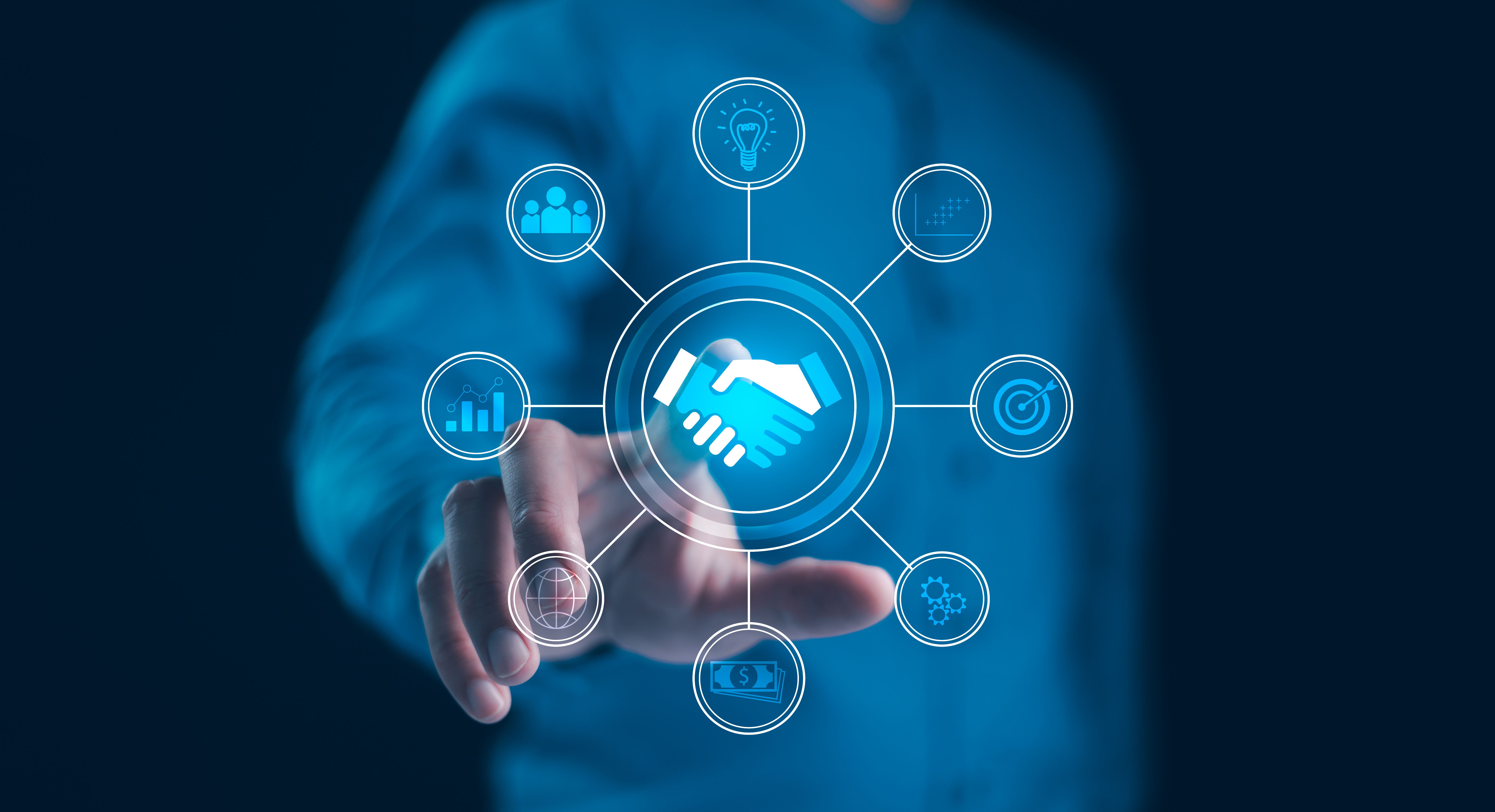 Global Business Partnership and Collaboration. A businessman touching a handshake icon at the center of a digital network, strategic alliances, financial growth, innovation, business ecosystem. Global Business Partnership and Collaboration. A businessman touching a handshake icon at the center of a digital network, strategic alliances, financial growth, innovation, business ecosystem.