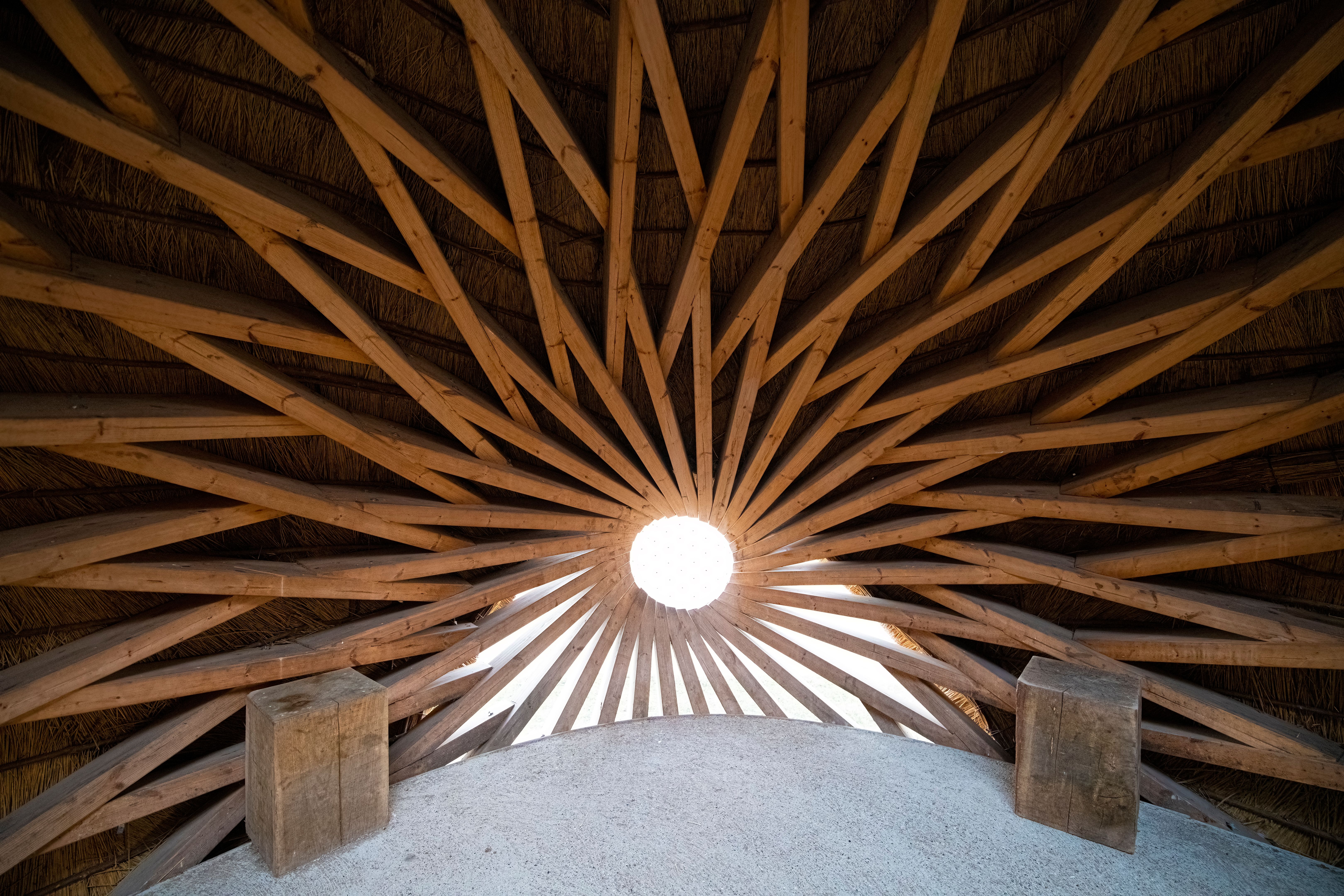 Beautiful symmetric wooden structure with a sun shape Beautiful symmetric wooden structure with a sun shape