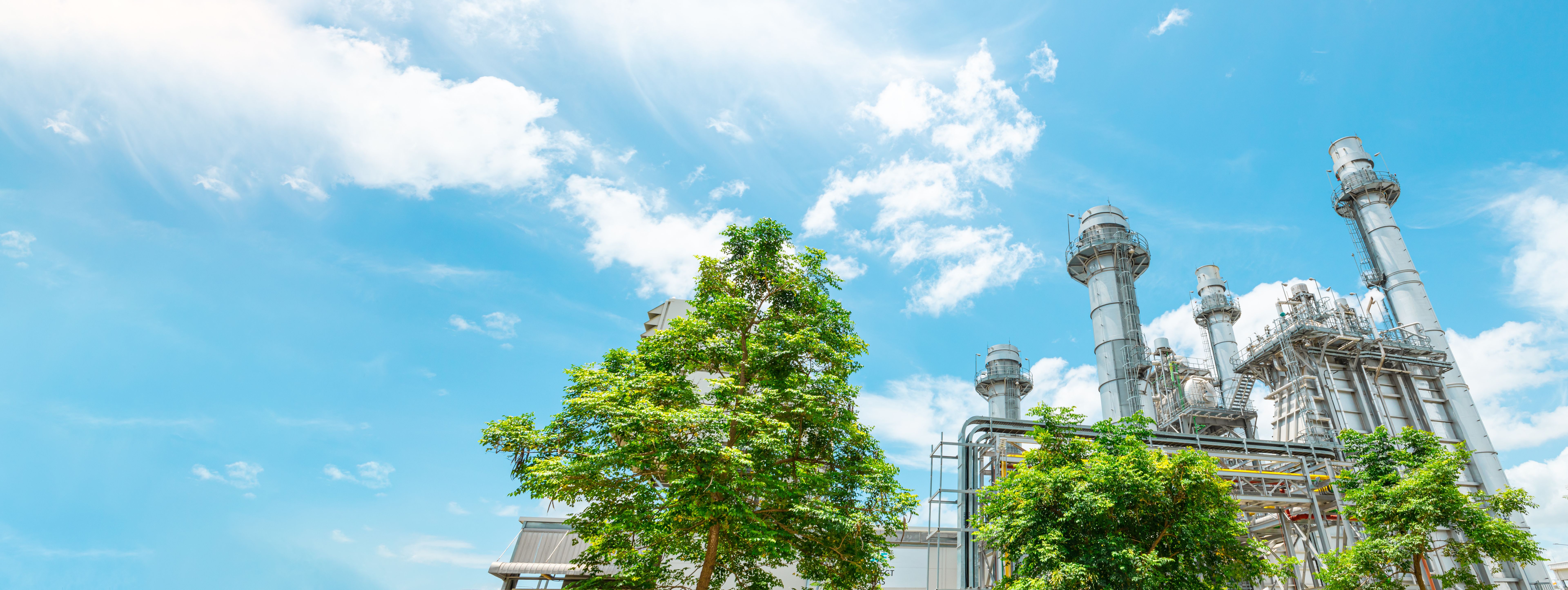 Wide banner with copy space of ECO Power plant Green factory for saving energy and sustainability environmental friendly concept Wide banner with copy space of ECO Power plant Green factory for saving energy and sustainability environmental friendly concept