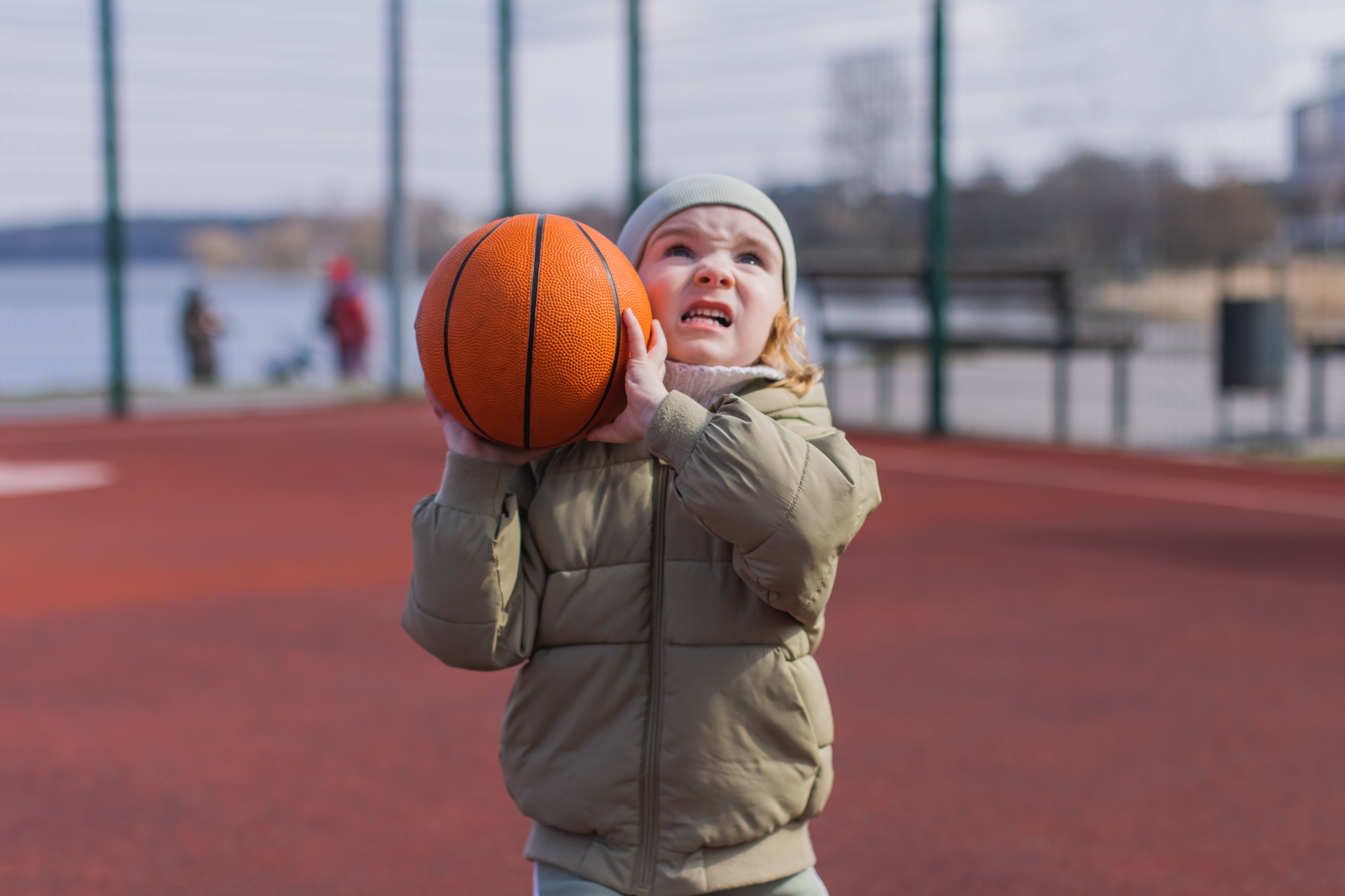 Boy with ball playing basketball Boy with ball playing basketball