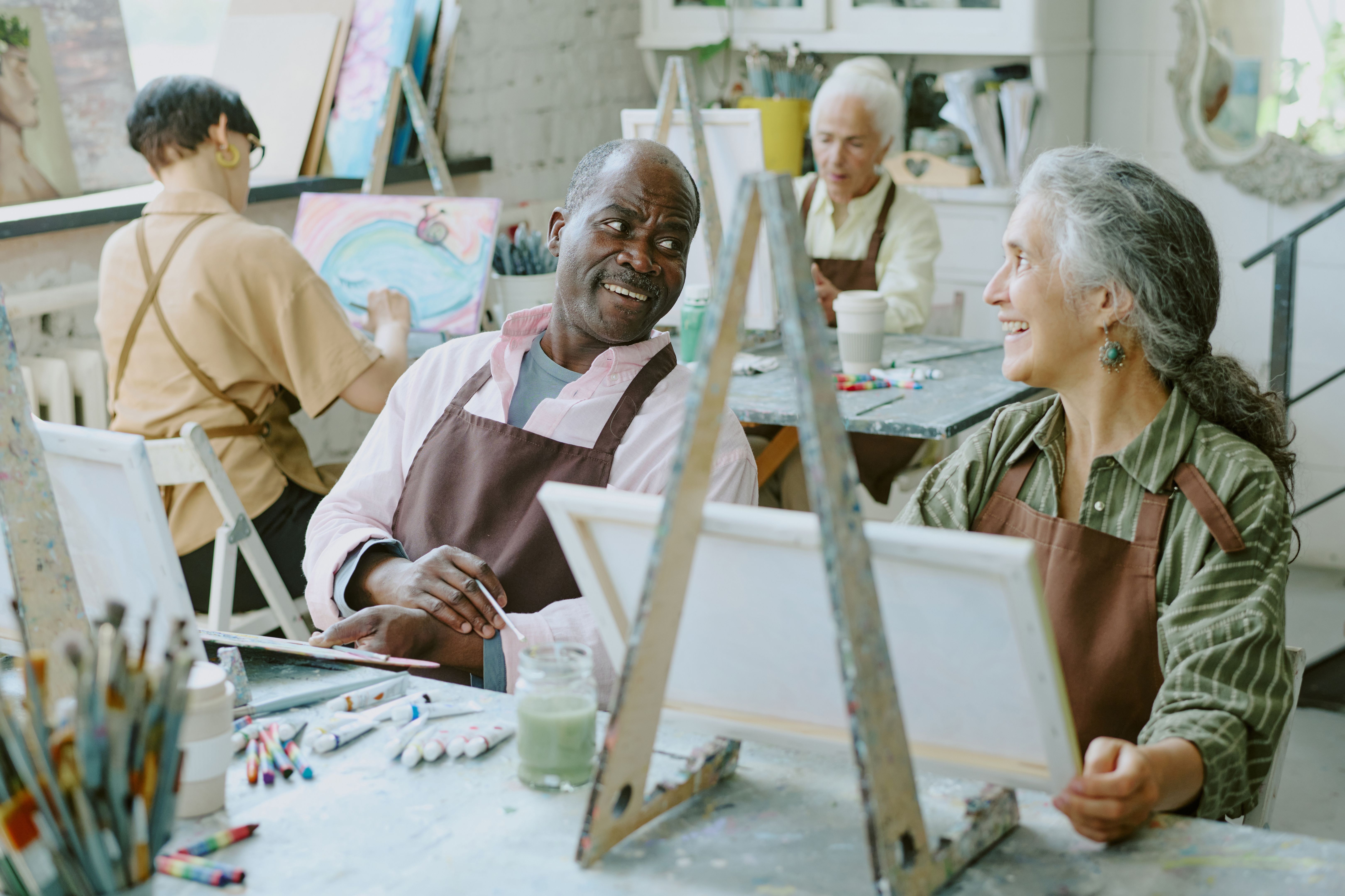 Senior Couple Chatting in Drawing Studio