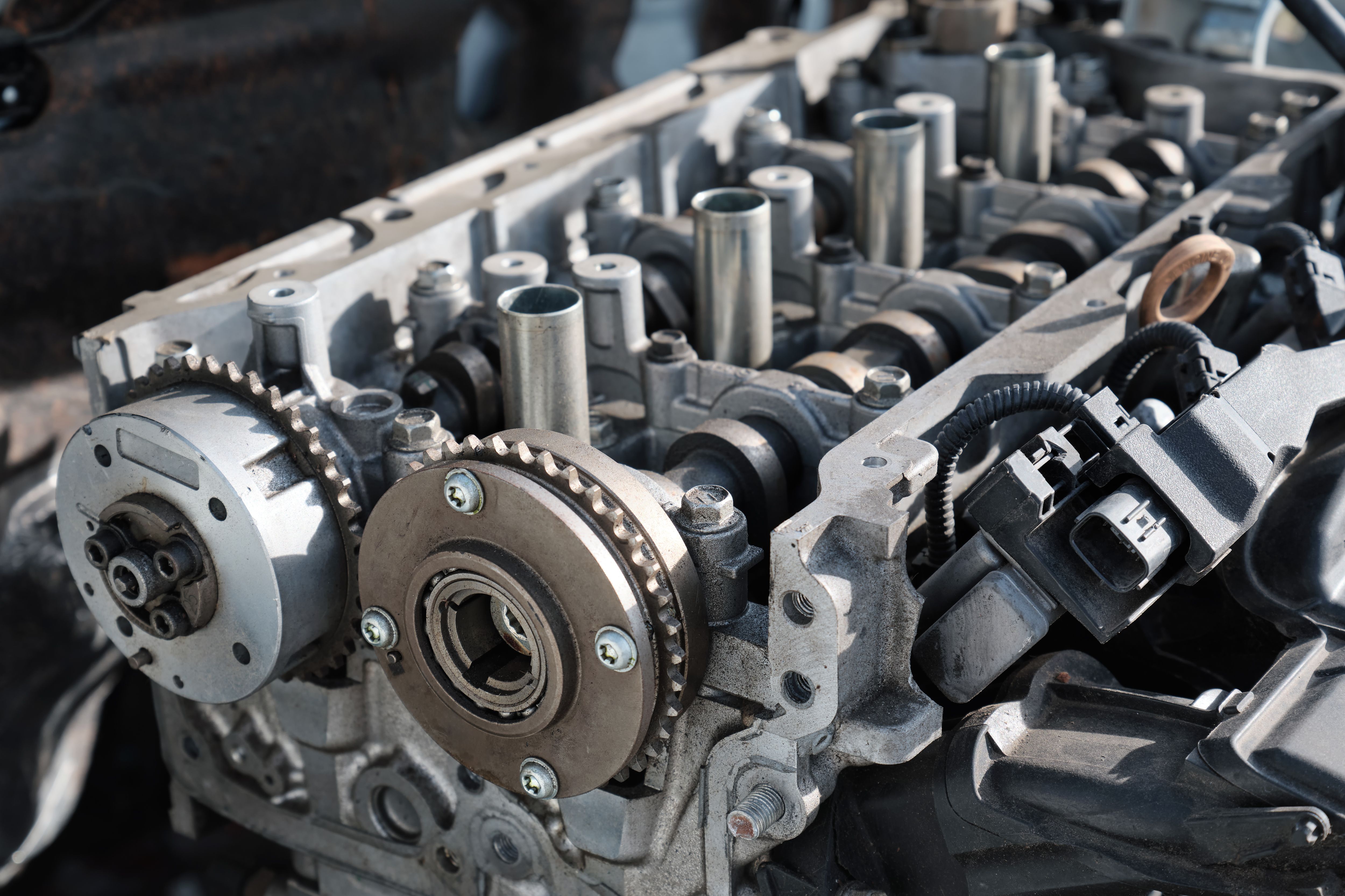 Gasoline internal combustion engine disassembly for repair in a passenger car.