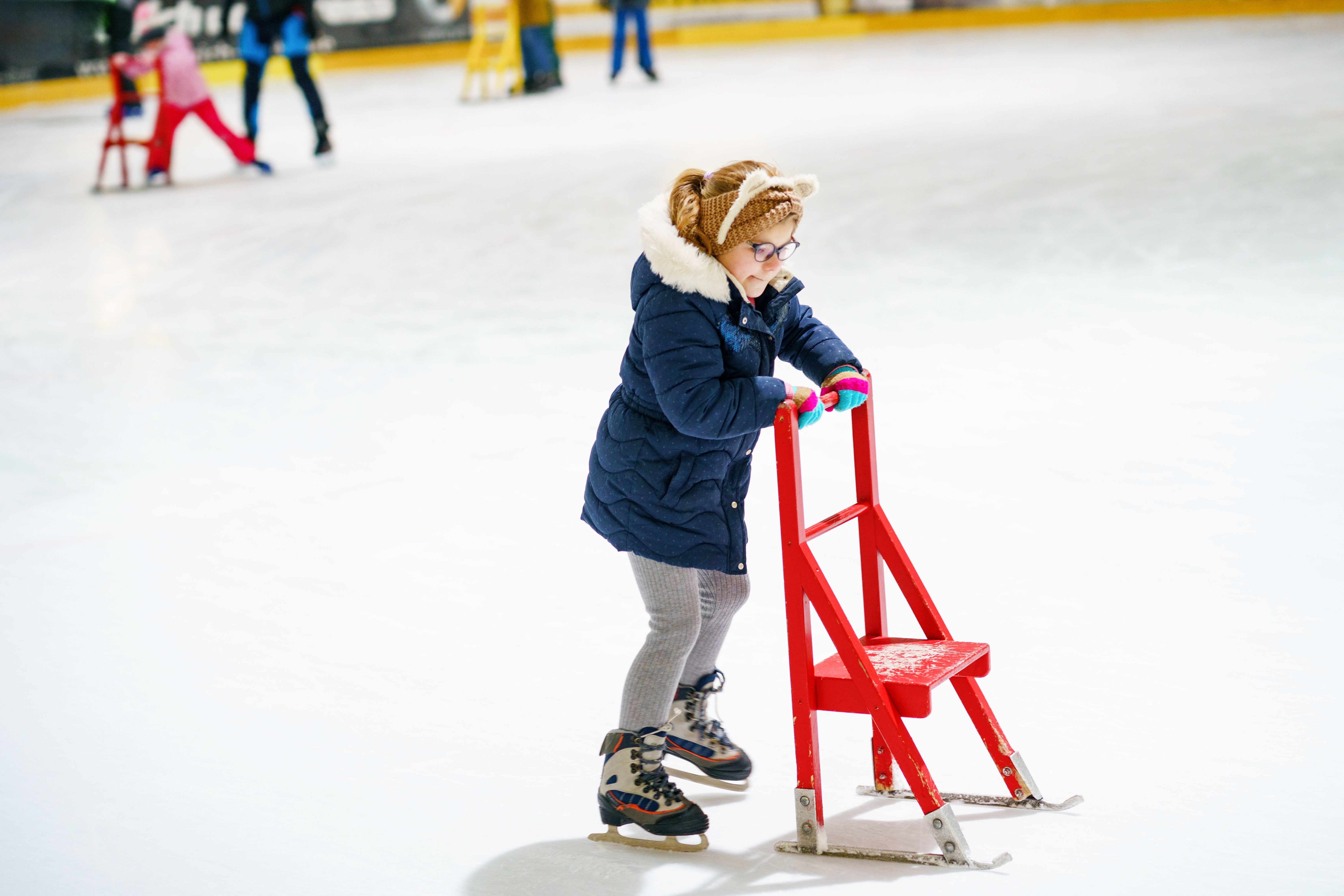 child learning skating