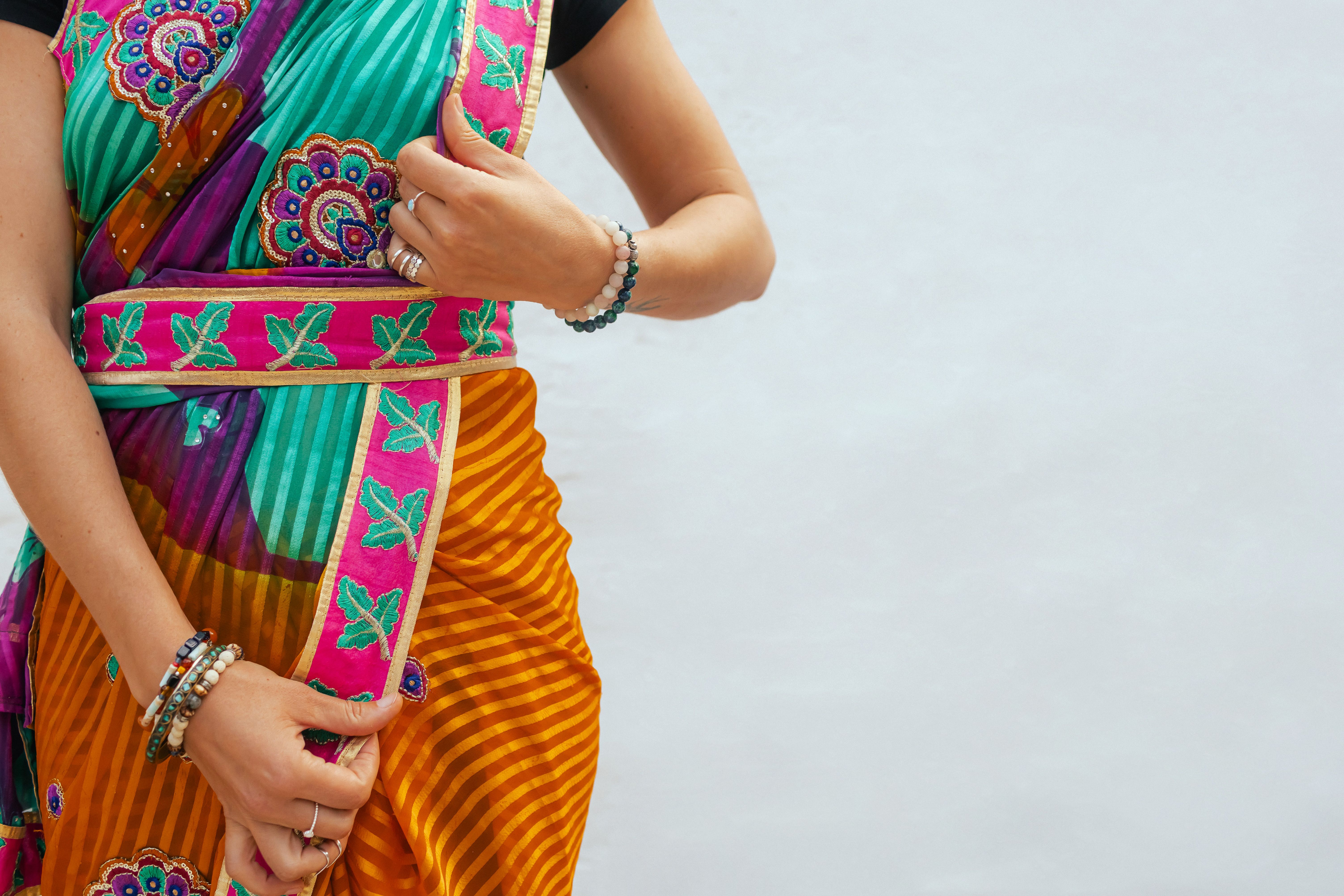 Close-up of Indian  Beautiful young girl in Traditional sari posing outdoors. Happy Diwali greeting photo. Part of a series