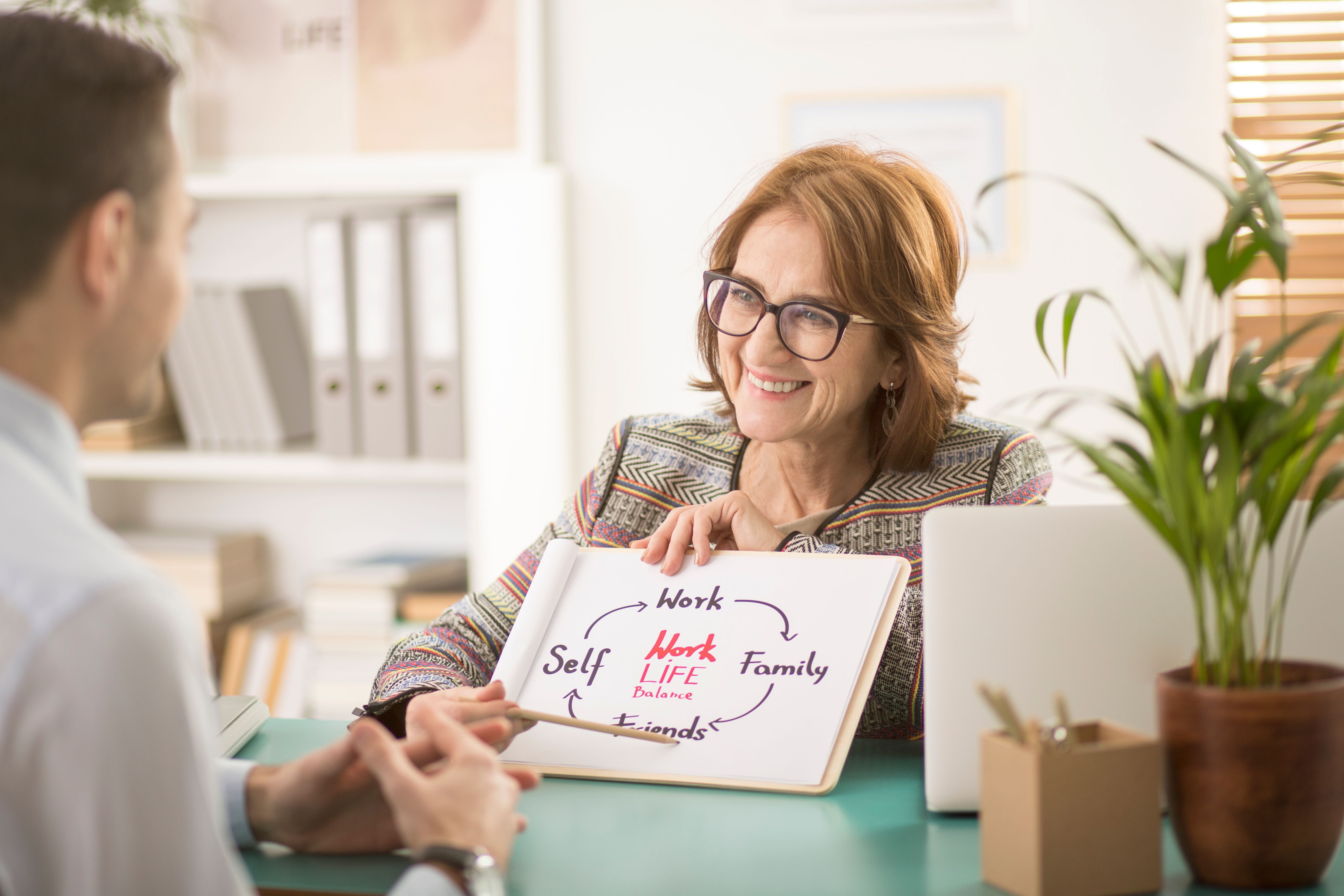 Smiling corporate life coach