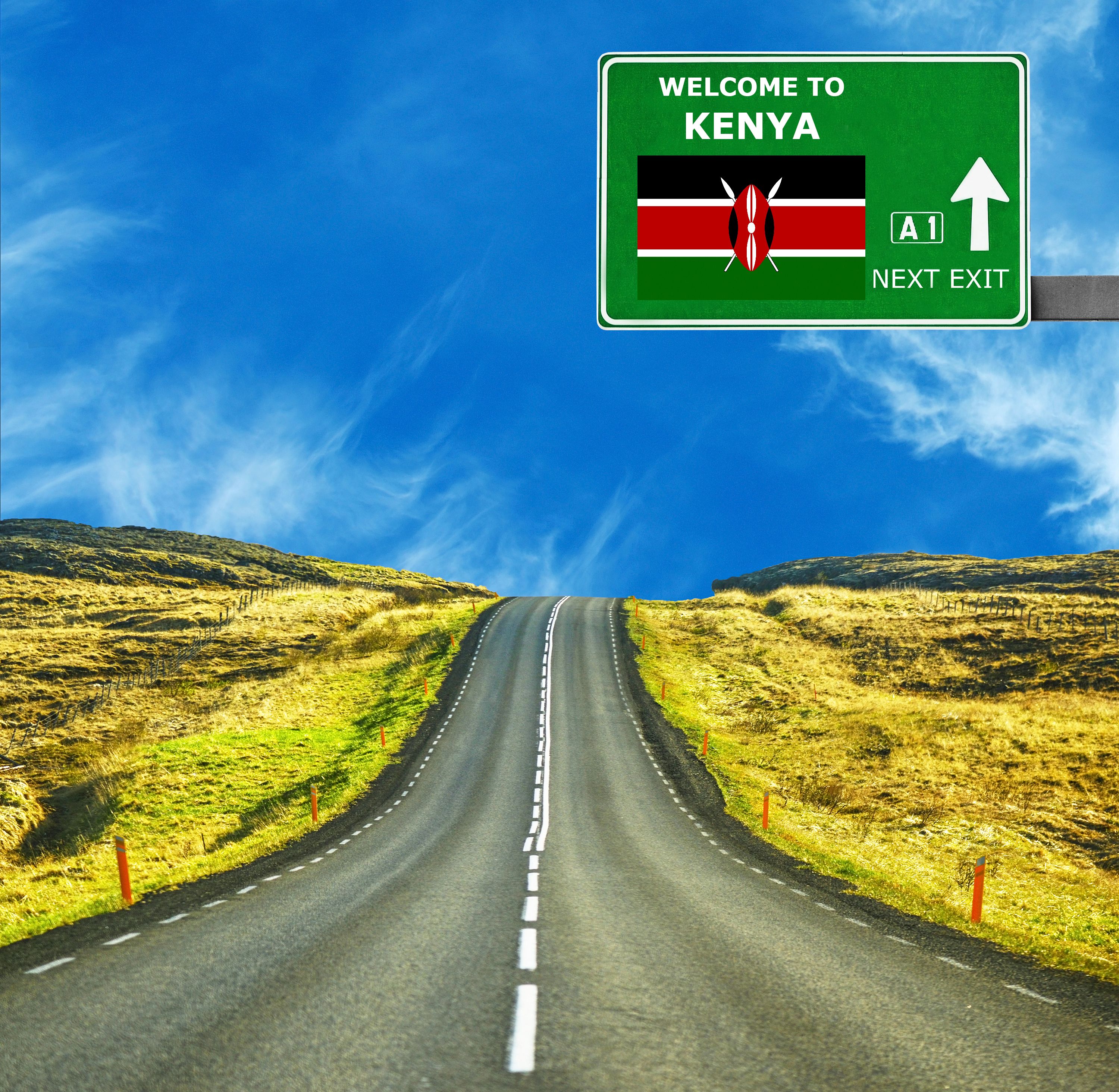 Kenya road sign against clear blue sky Kenya road sign against clear blue sky